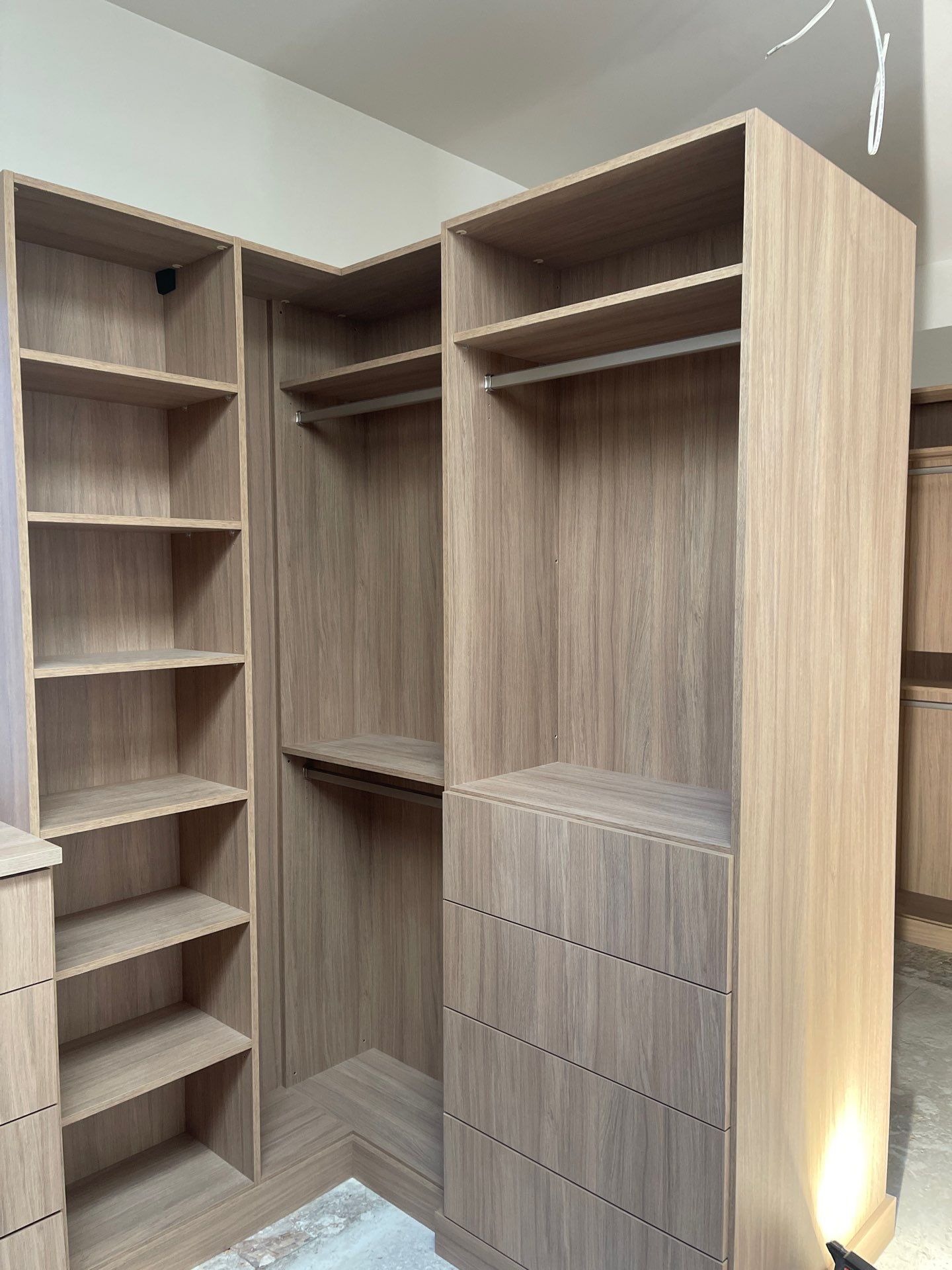 Expansive Primary Closet in Cherry Hills Village by Concept 32, Inc.