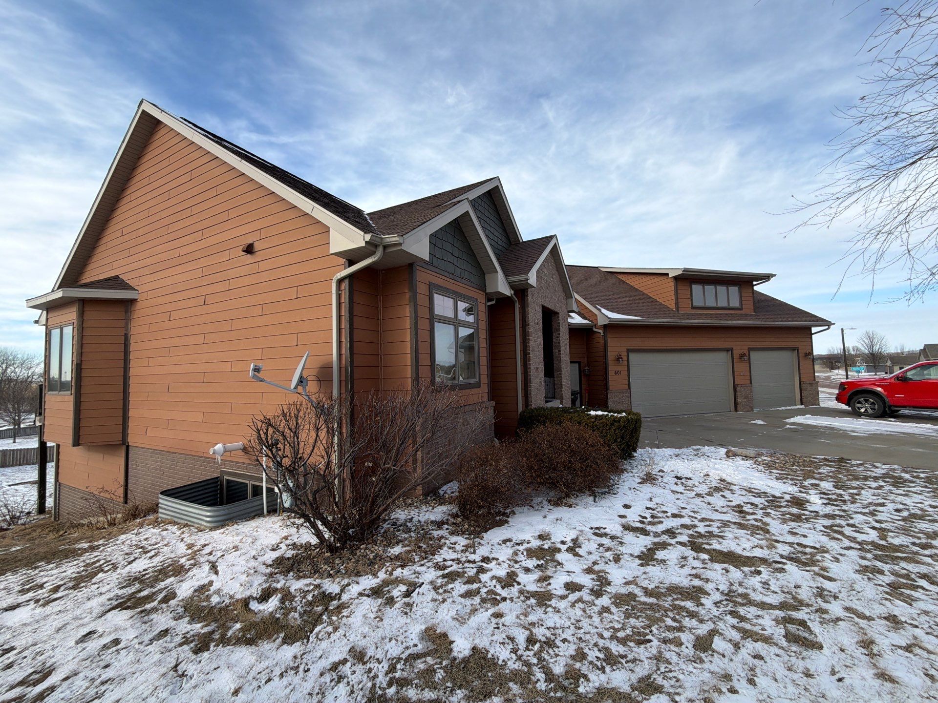 Residential Exterior Painting and Siding Restoration in Crooks by Select Painting, Coatings & Garage Cabinets