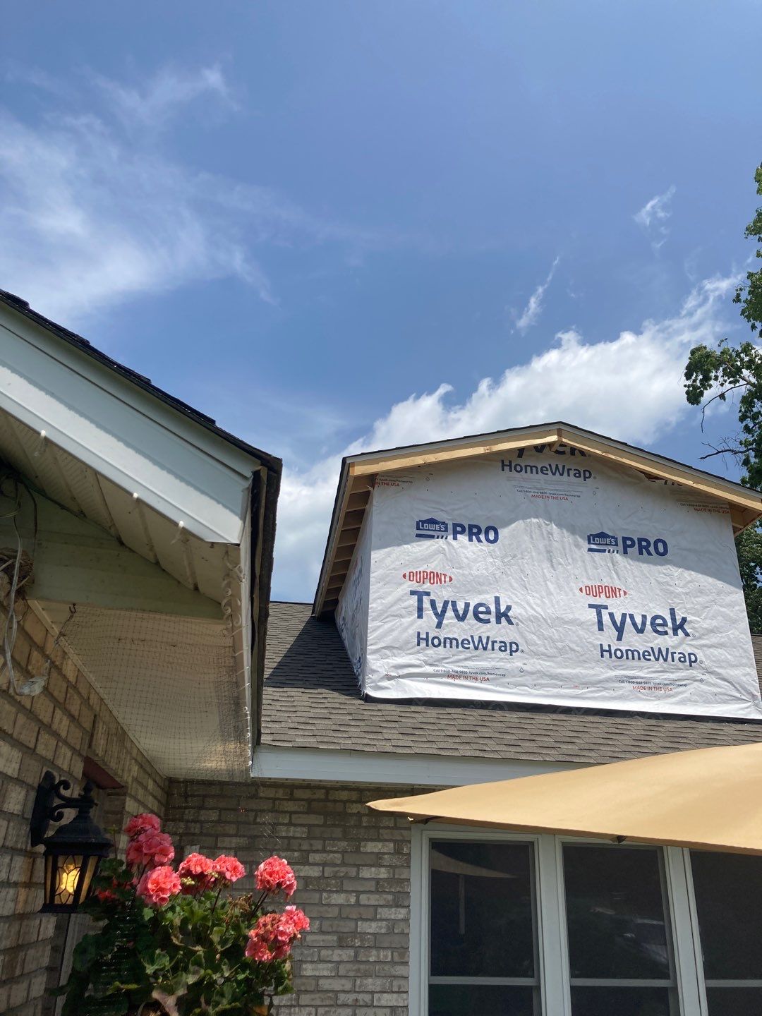 Gutter Installation using 5" Seamless Aluminum Gutters by Absolute Roofing and Construction