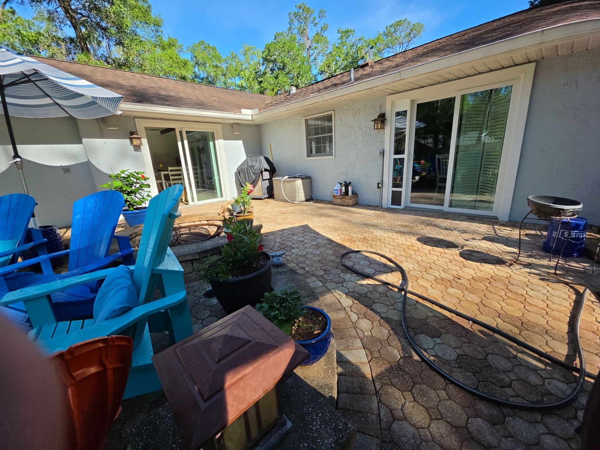 Custom Sliding Glass Door Installation with Integrated Pet Doors in Gainesville by Windows & Doors Store
