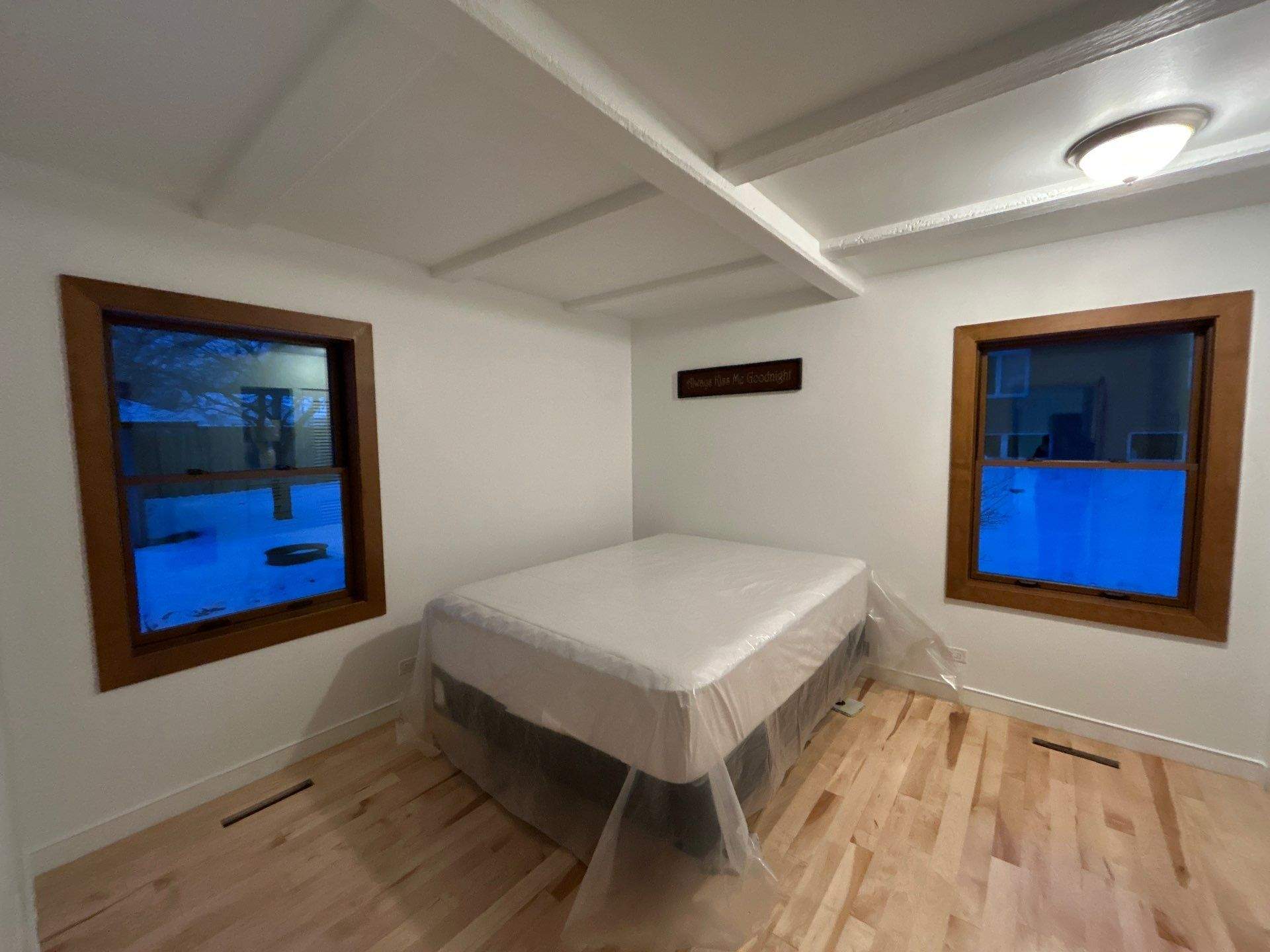 Black-Frame Pella Lifestyle Upgrade on a Partial Brick Home by United Windows and Siding LLC