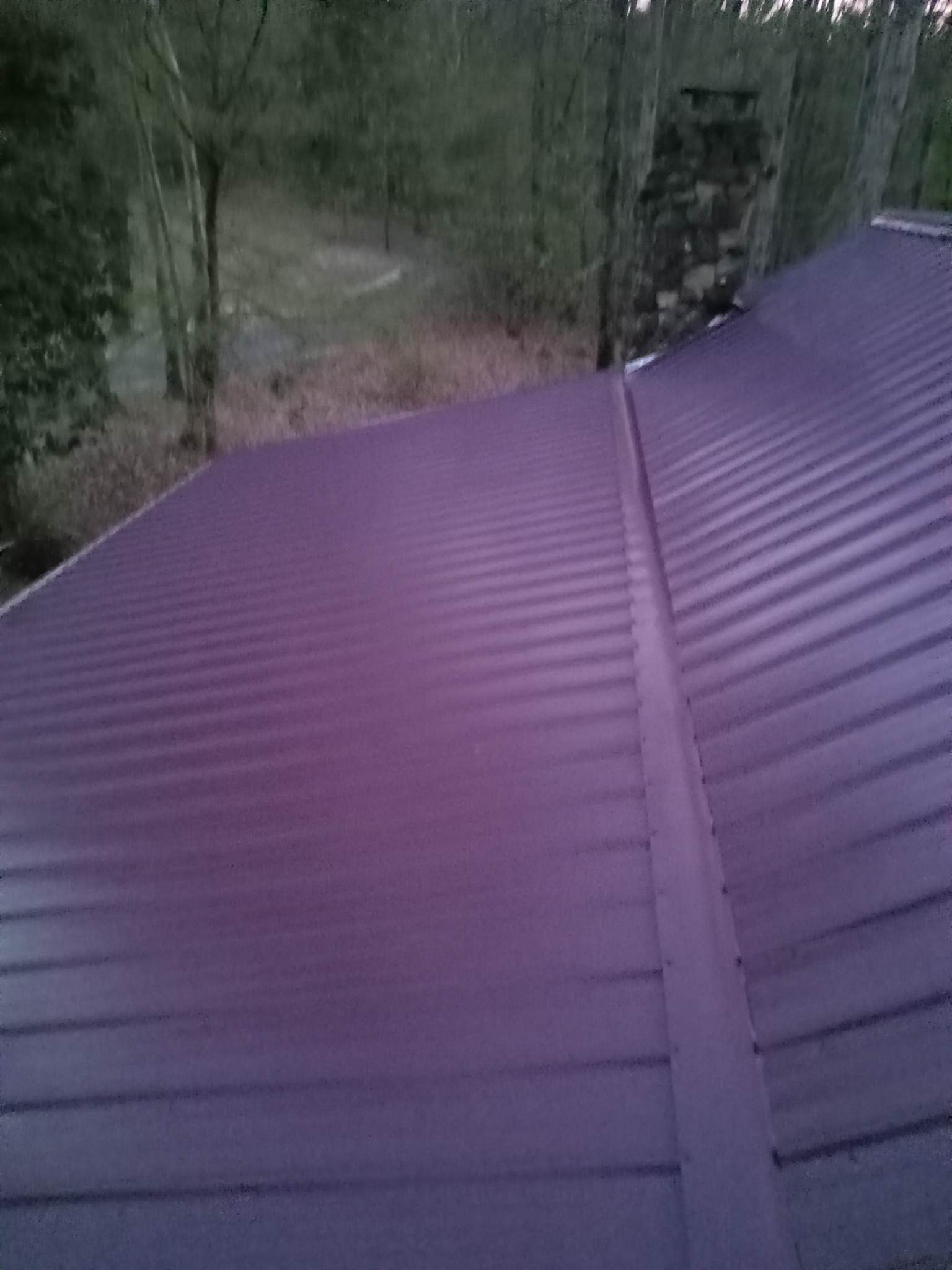 Residential Roofing Installation using Aluminum Roofing panels by Hostetler Roofing