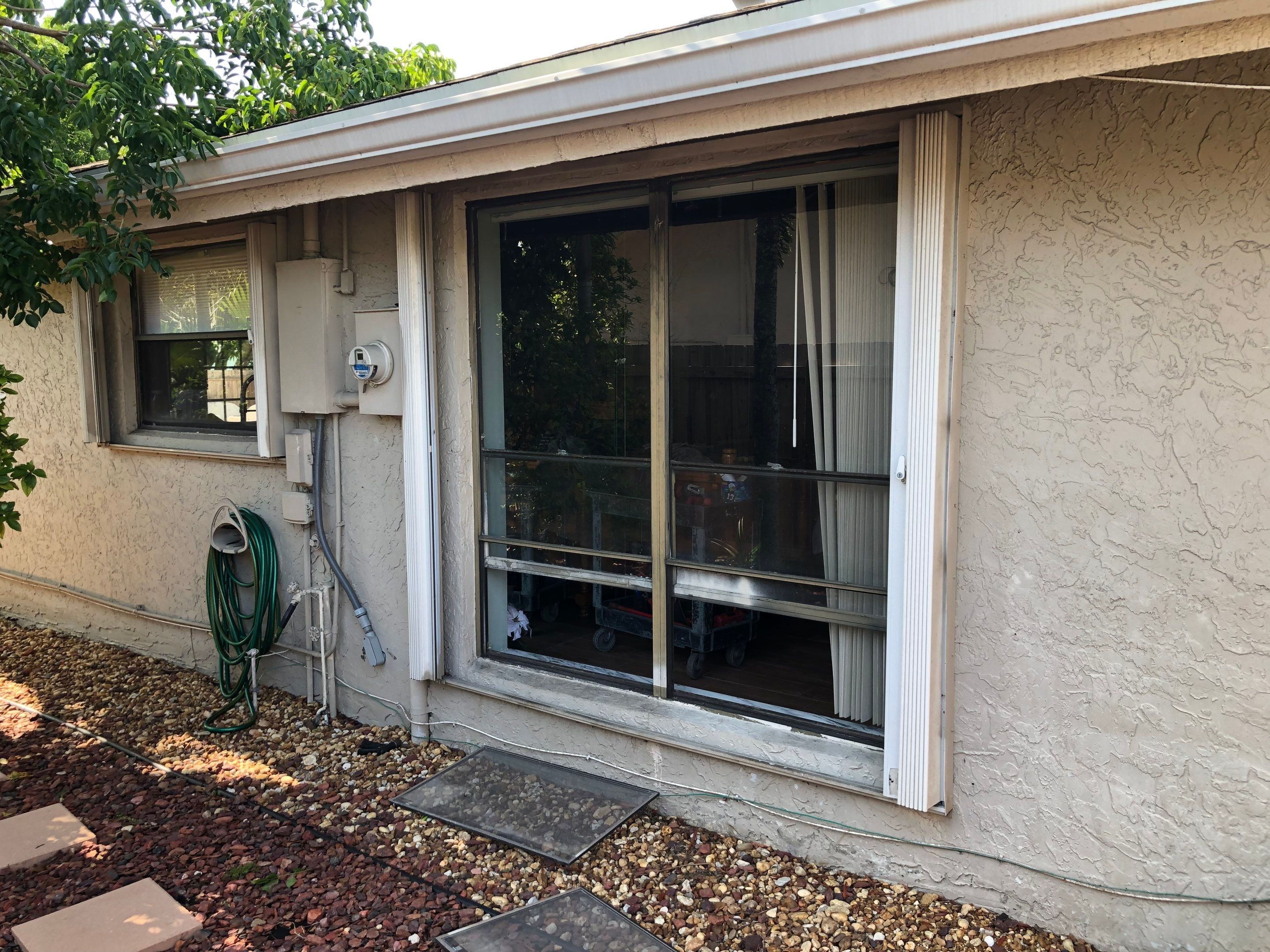 Impact Window Installation & Sliding Glass Door to Window Conversion – Coconut Creek, FL by The Door Doctor of South Florida, Inc.
