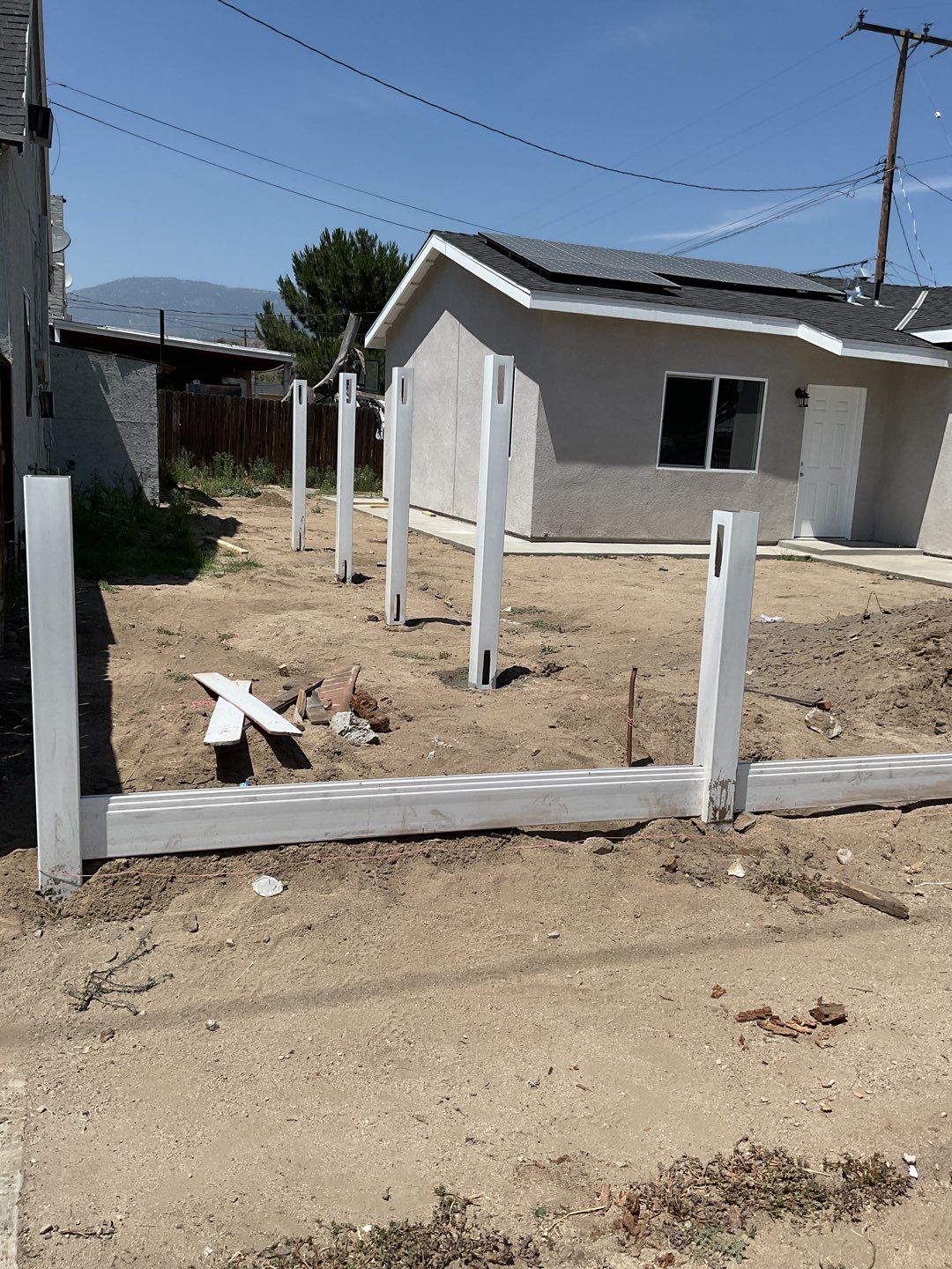 Fence installation using 6ft and 4ft vinyl  by Fence Guys Inc. 