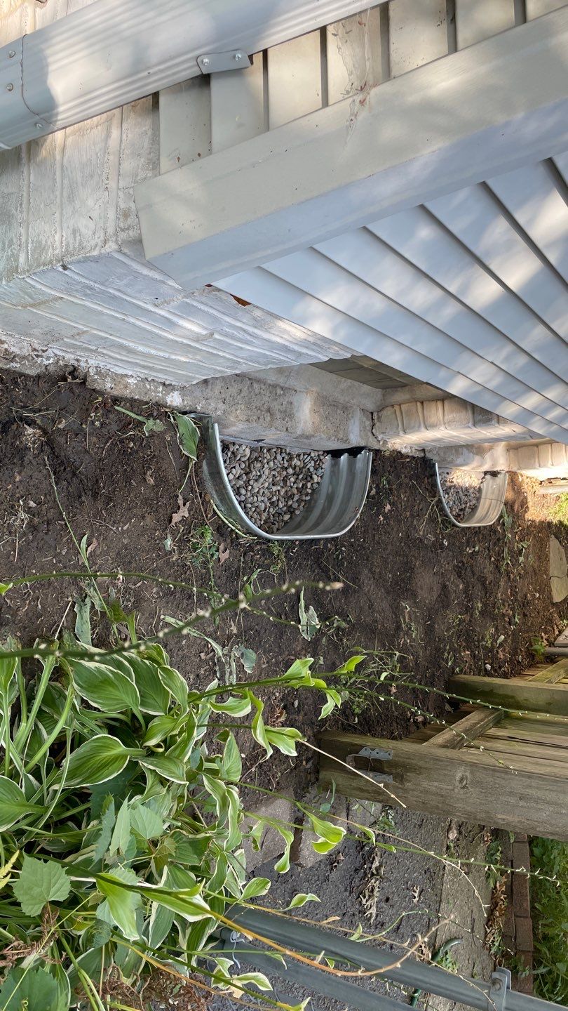 Drain Tile, Window Wells & Buried Discharge in Minneapolis by Waterproofing Northeast