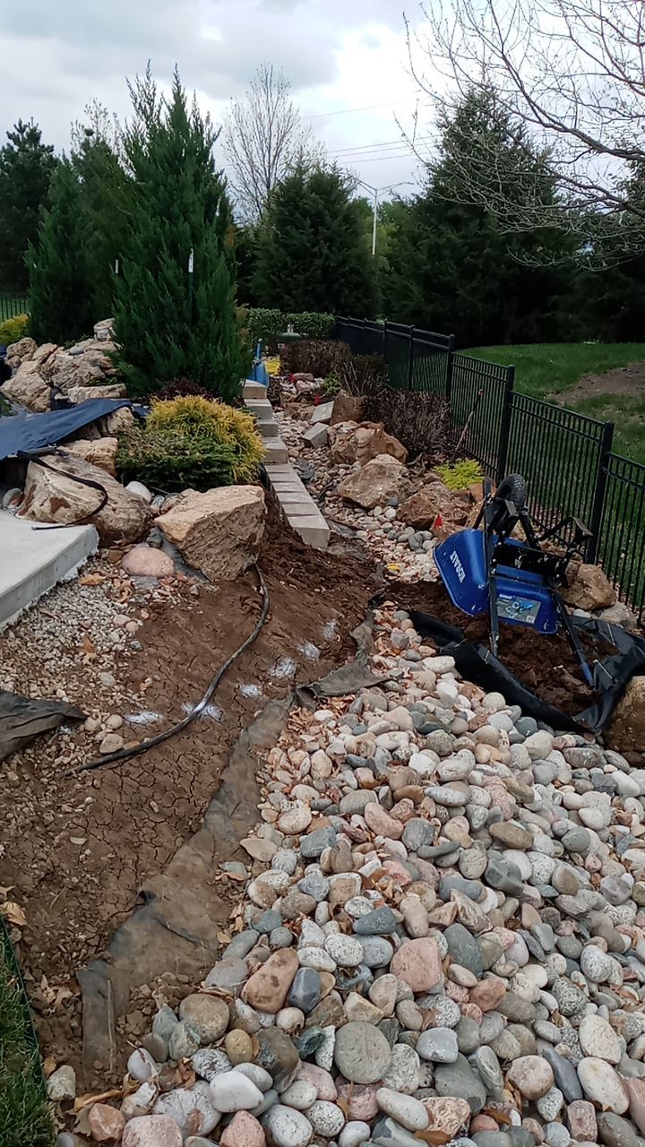 Pool Retaining Wall by LAND ESCAPES LLC