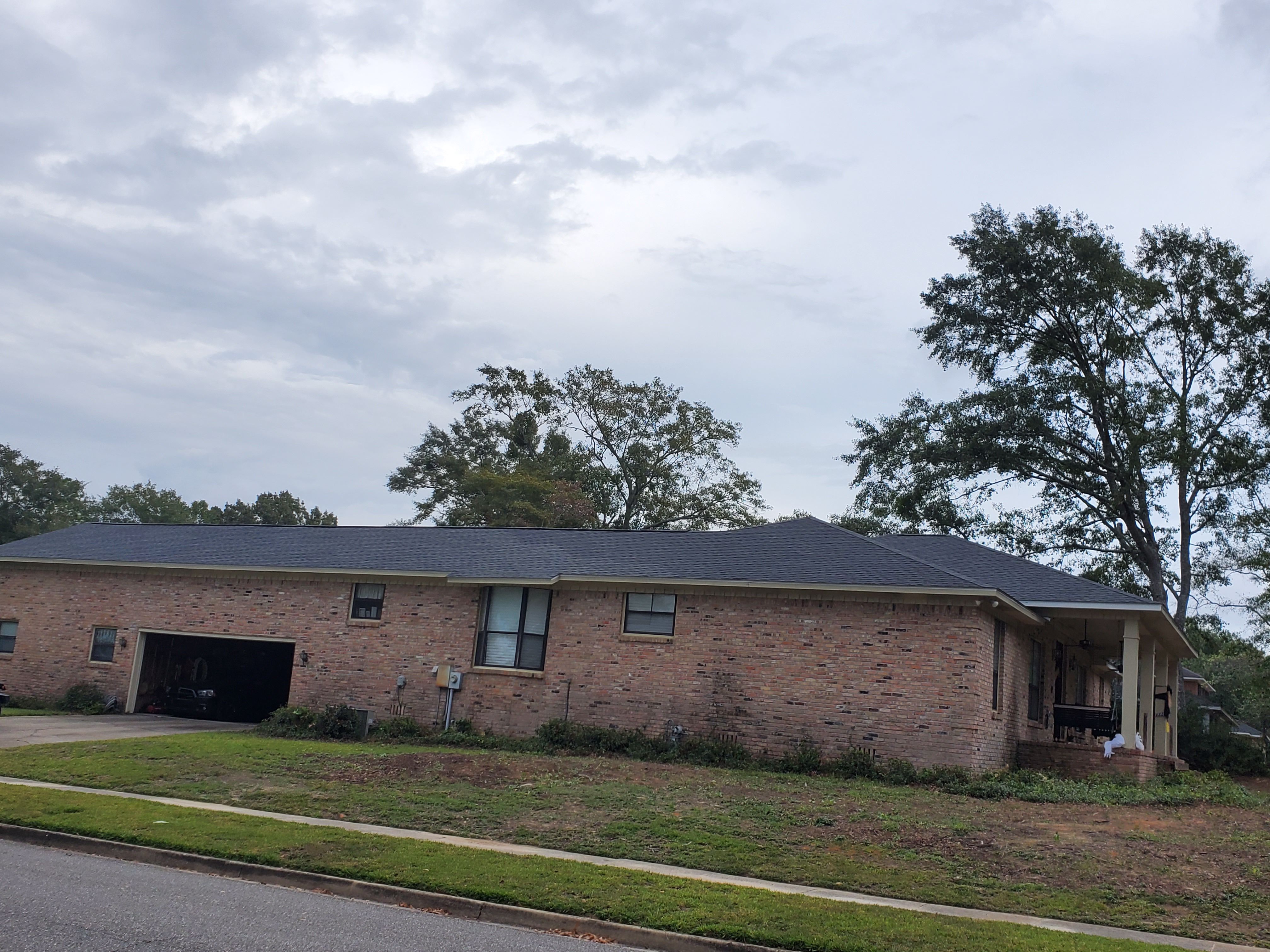 Residential Roofing Installation using Roof Replacement by American Roofing & Construction LLC