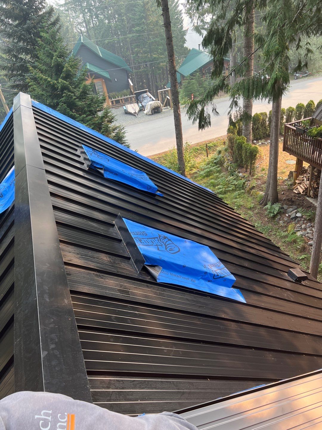 Residential ReRoofing Installation using 12" Prolok metal  by Top Notch Roofing Inc