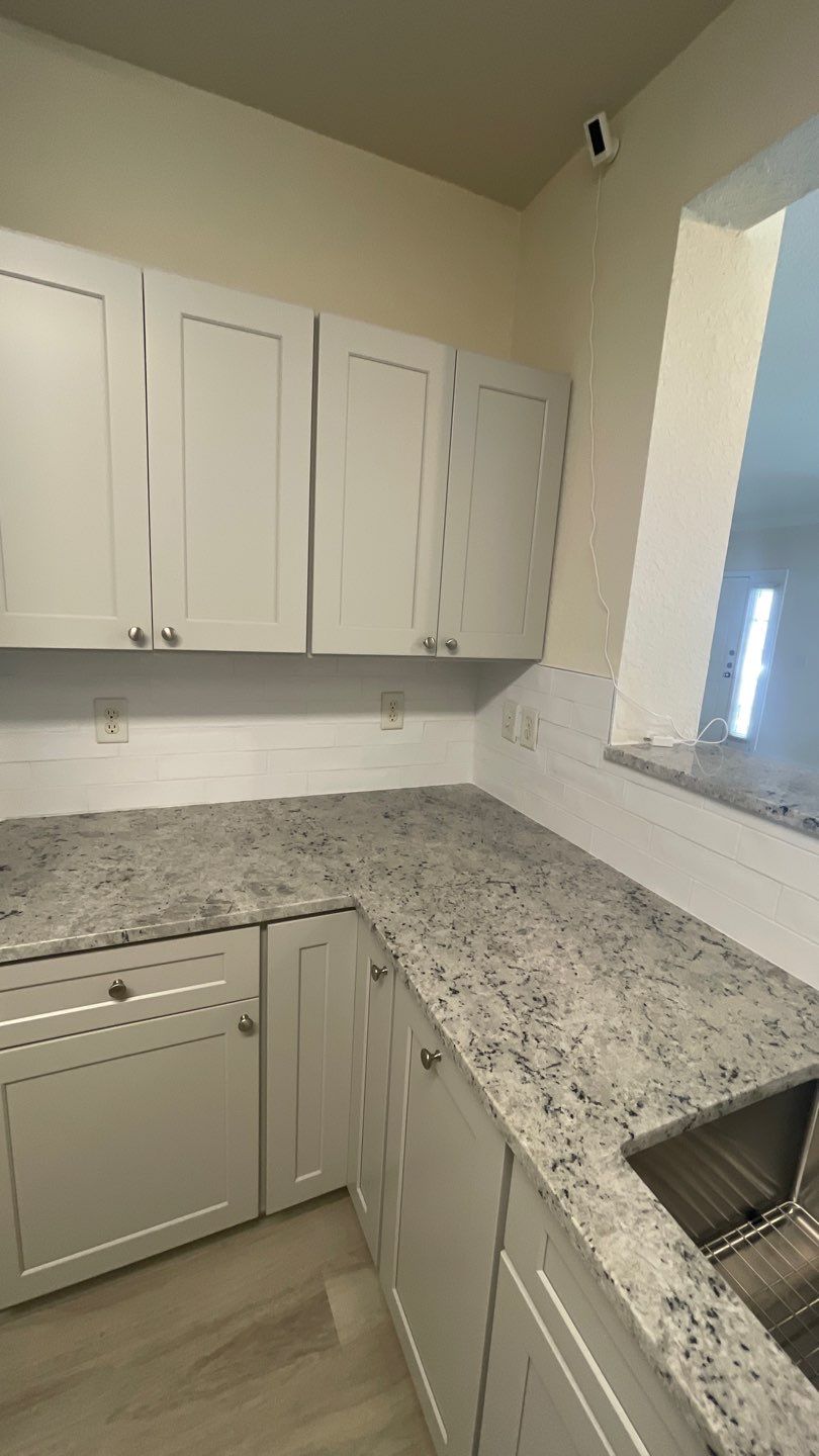 Home Remodel using LVP Flooring and Cabinets by HandyMangum
