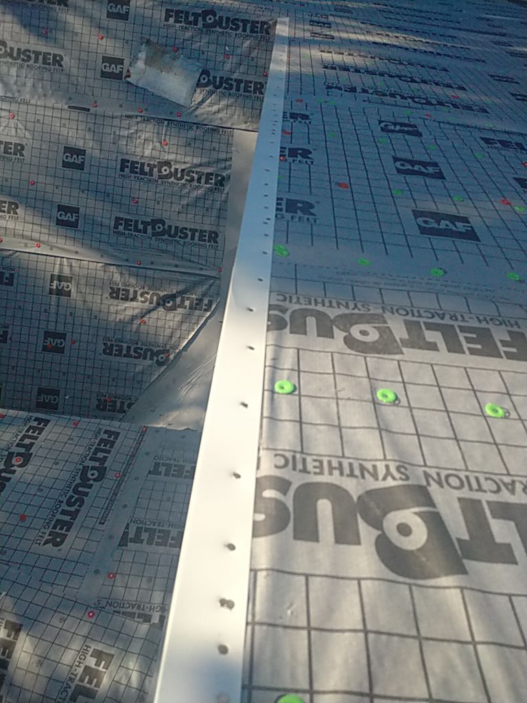 Residential Roofing Installation using Roof Replacement by American Roofing & Construction LLC