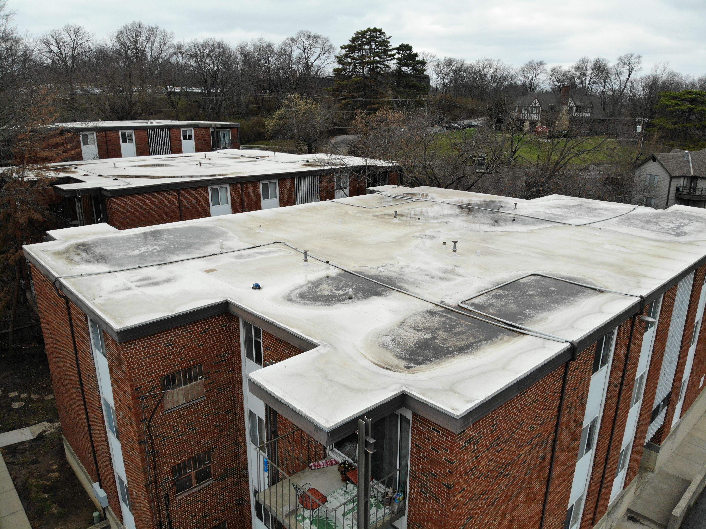 Commercial Flat Roofing System - PVC Membrane & Fluid Applied Coatings  by Titan Commercial & Residential Roofing 