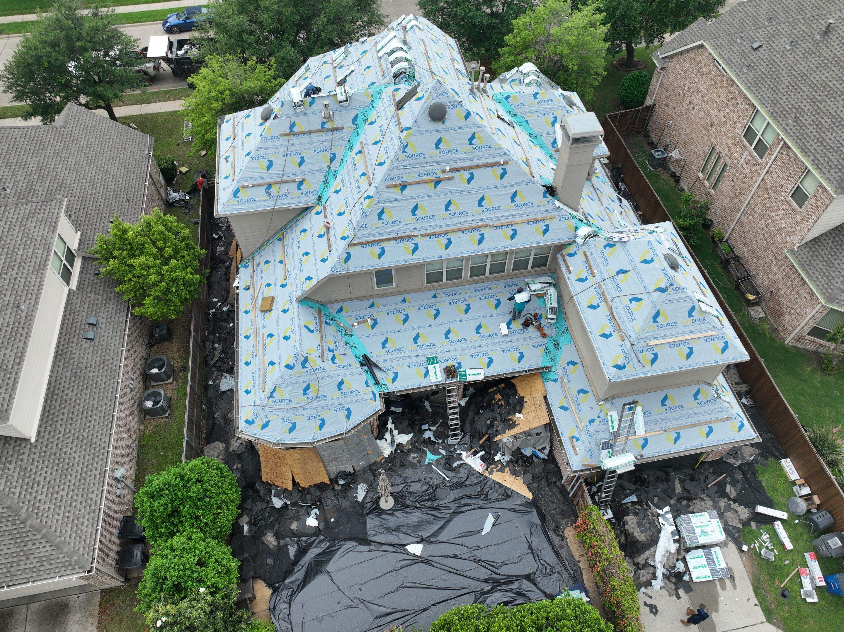 Residential Roofing Installation using Malarkey Highlander Weathered Wood Plus by OneSource Roofing and Restoration