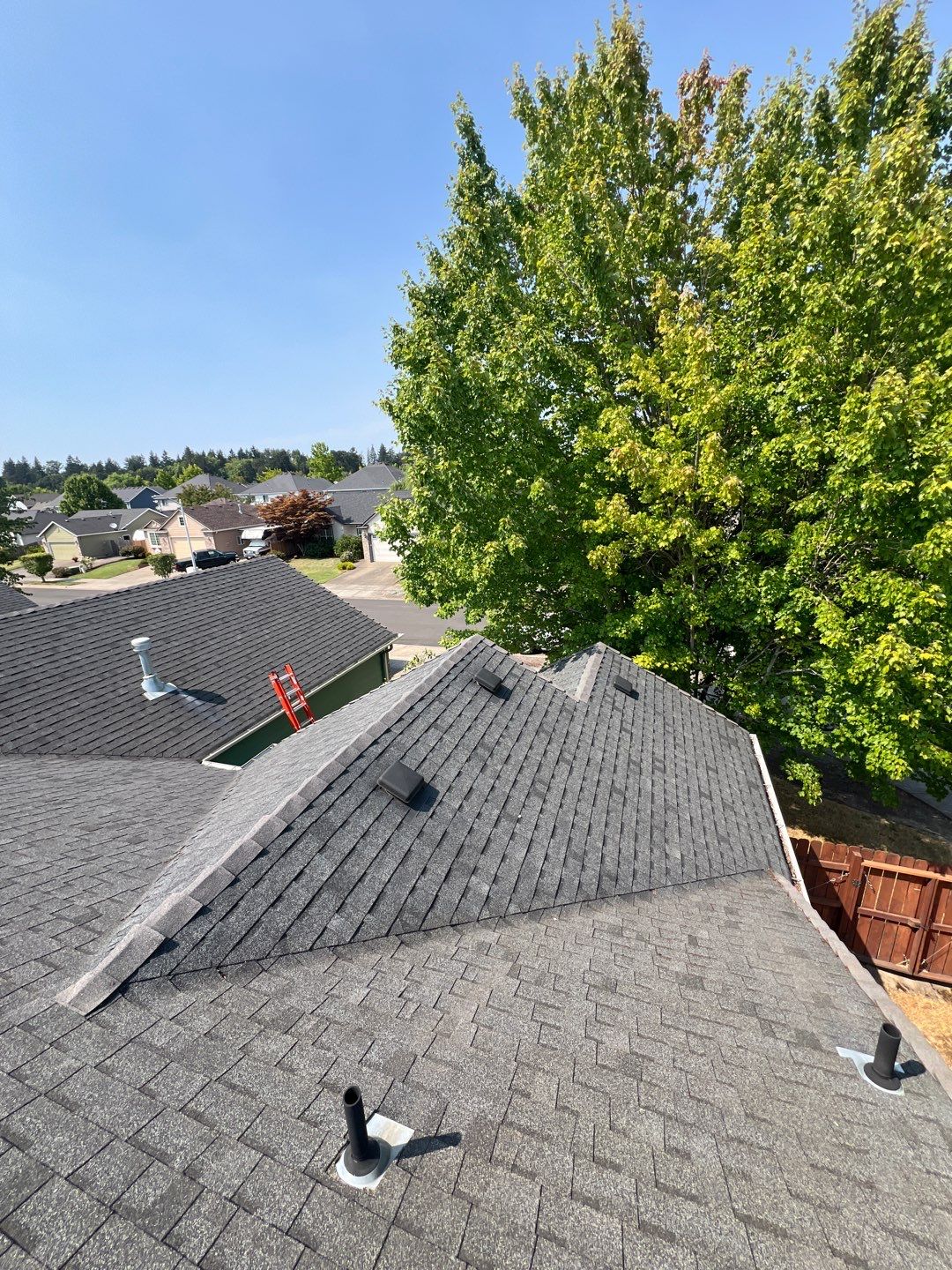 Residential Roofing Installation using IKO Dynasty (Color: Granite Black) by Orezona Building & Roofing Company, Inc.