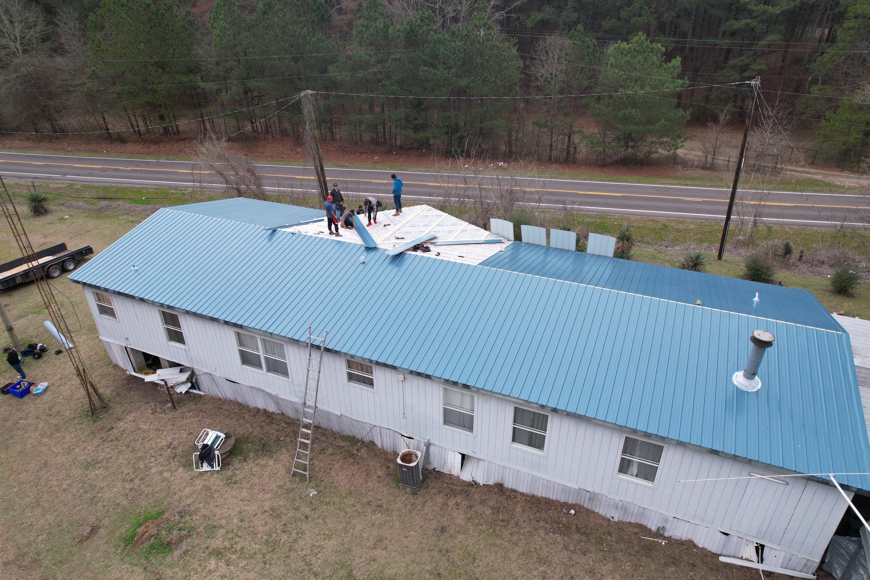 Residential Roofing Installation using 29 gauge metal by Hostetler Roofing