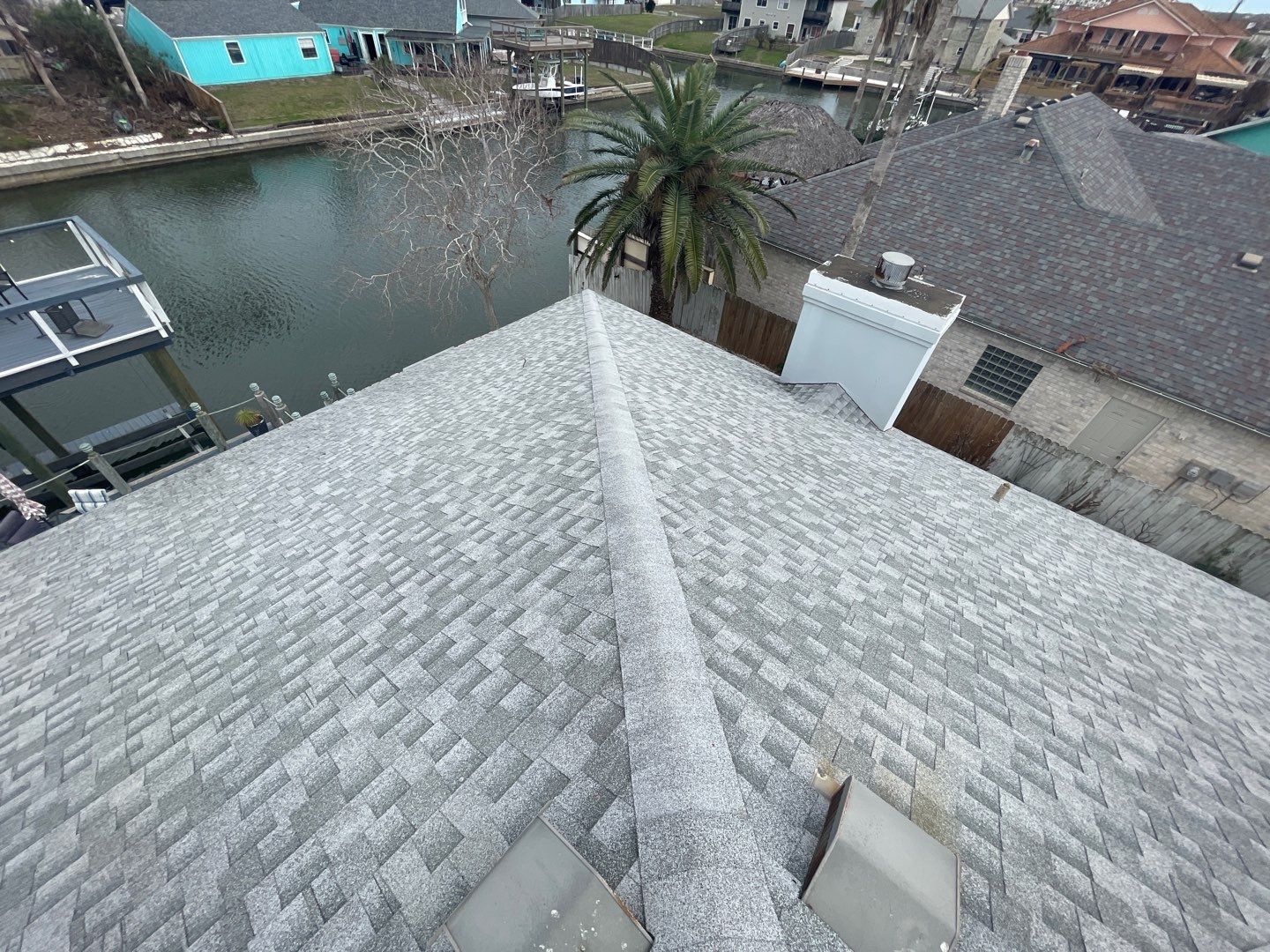 Residential Roofing Repair using Galvanized Chimney Cap & Chase by Lighthouse Roofing