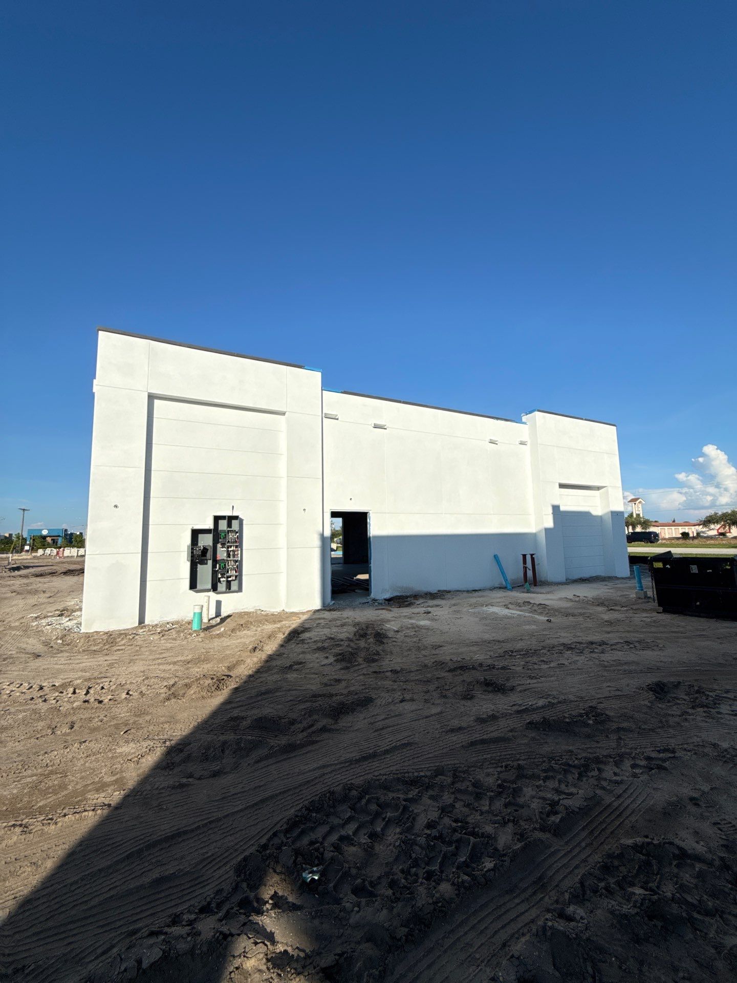 Downspout Installation using collector head in Cape Coral FL by Gutter Professors