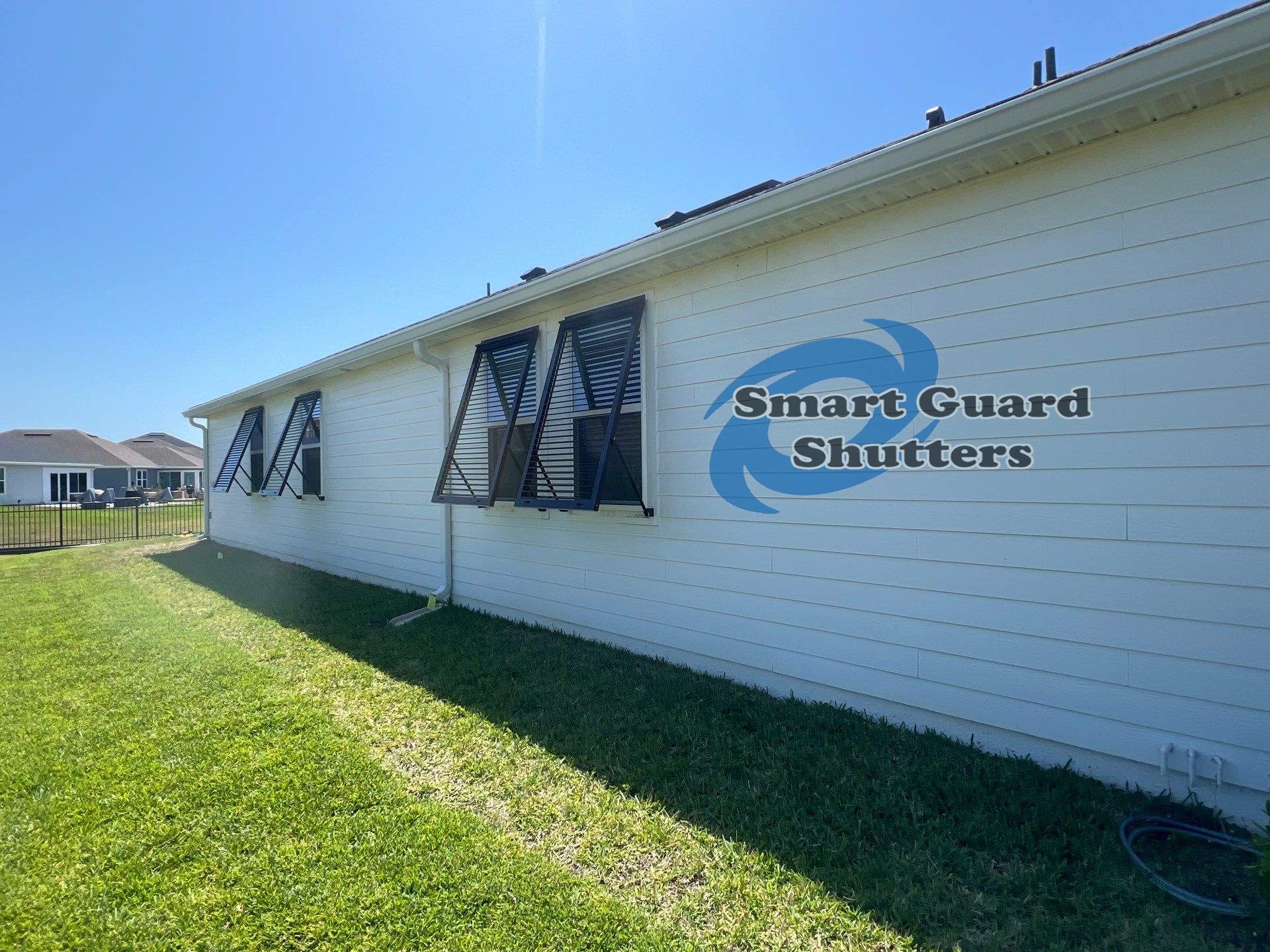 Impact Bahamas In Grey Brown by Smart Guard Shutters