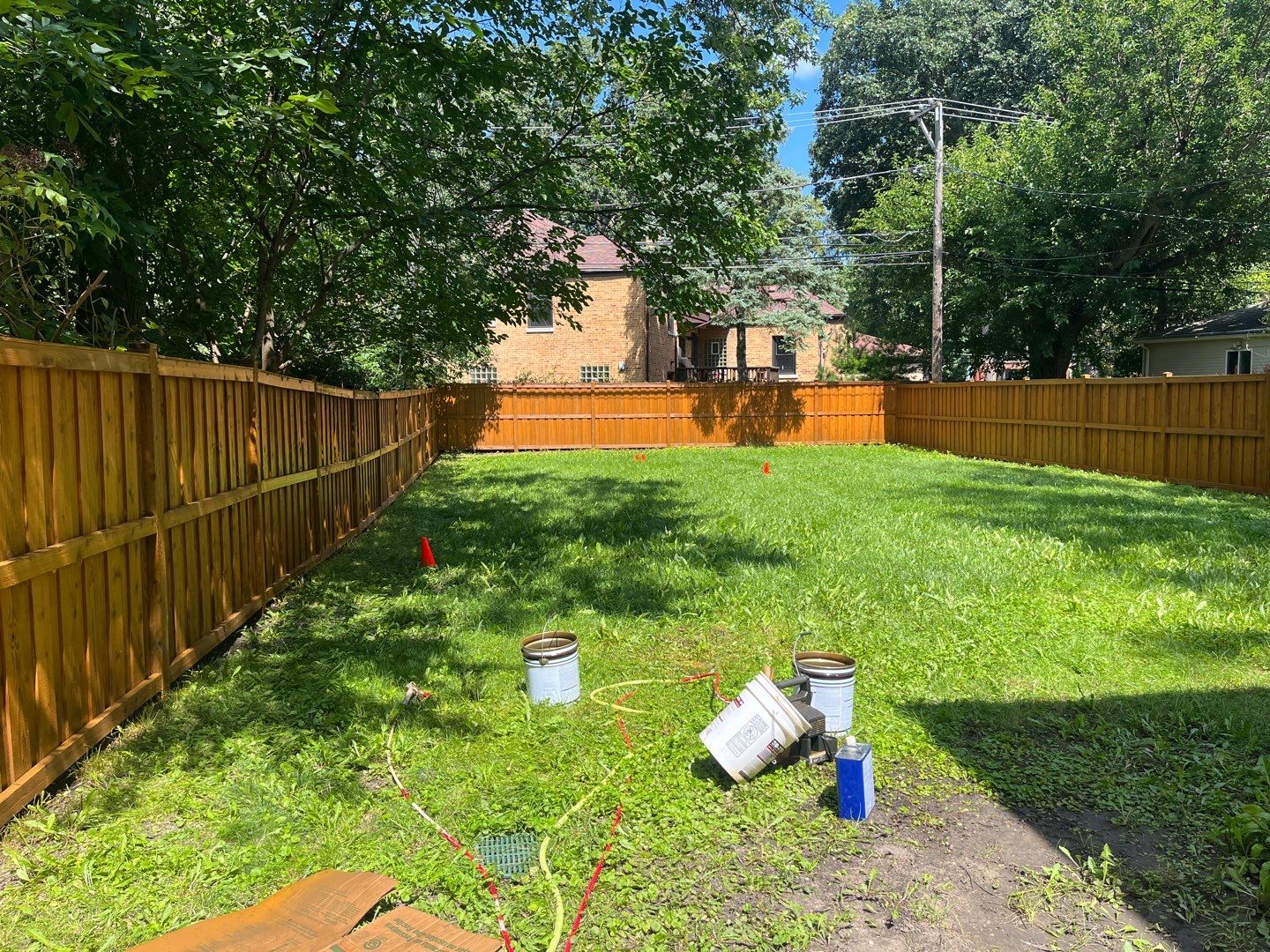 Wood fence cleaning and sealing by Northern Power Washing LLC.