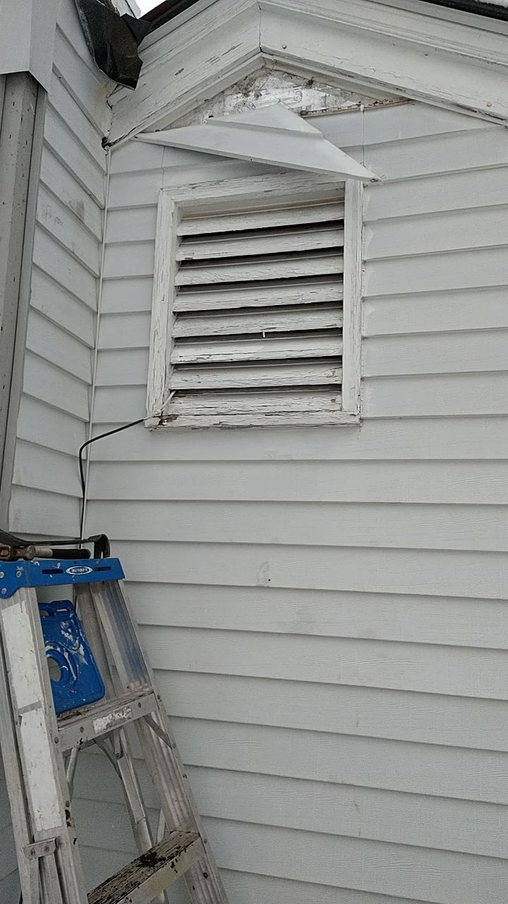 James Hardie Siding  using James Hardie Board and Batten, White by Absolute Roofing and Construction