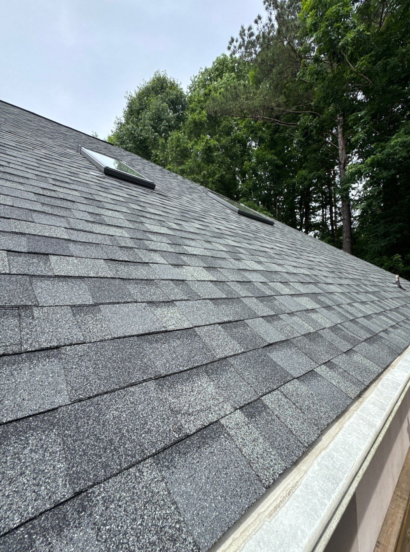 Residential Roof Replacement with Owens Corning Duration Architectural Shingles and 5 Velux Skylights in Charlotte, North Carolina by Merritt Roofing LLC