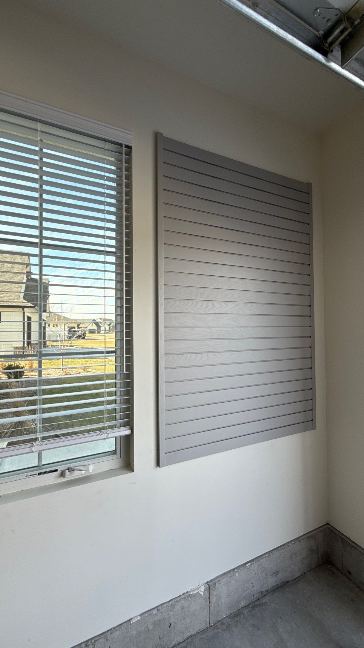 MKE Textured Grey Slatwall Creates A Perfect Storage Start  by Banner Garage