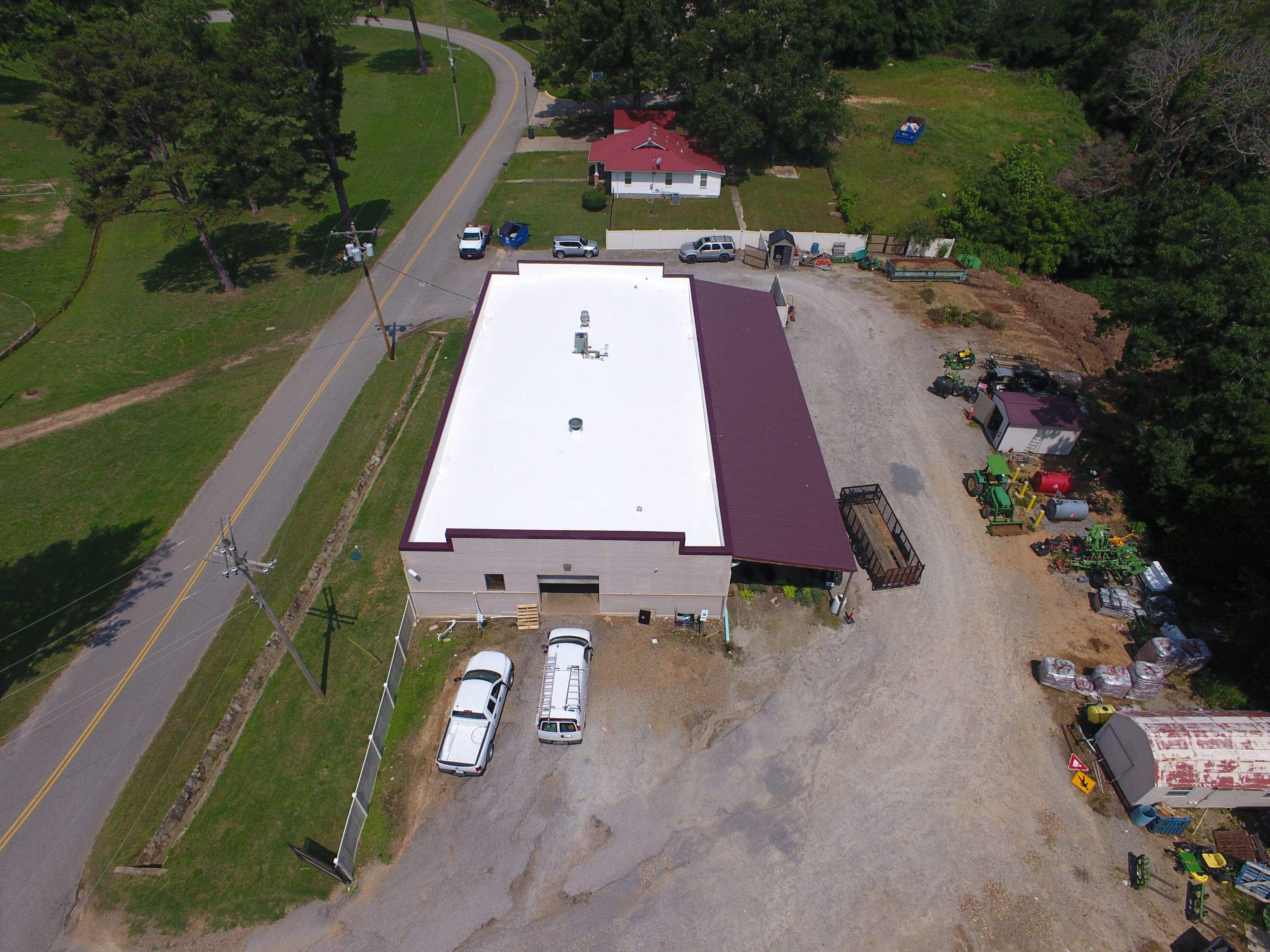 Choctaw Nation Healthcare Center - White Building by Hostetler Roofing