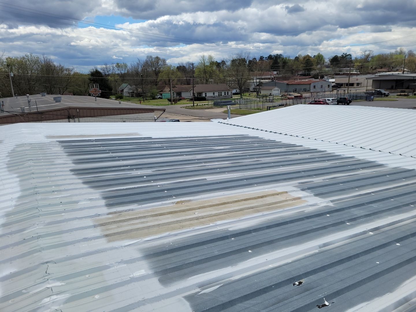 Commercial Metal Restoration System using Aldocoat Coatings by Hostetler Roofing