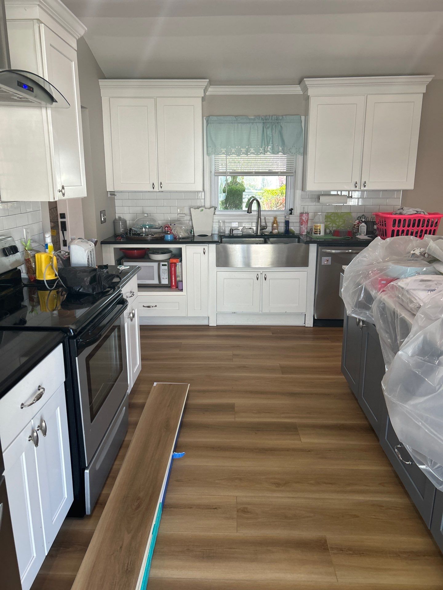 Water Damage Restoration and Full Laminate Floor Installation in Stony Brook by EMS Restoration Corp