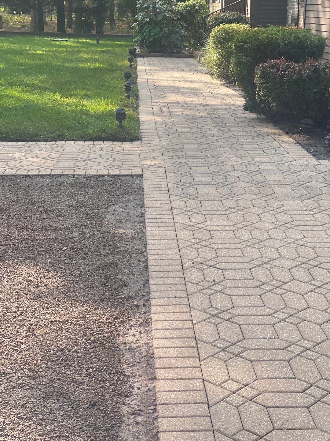 Pavers Cleaned, Garage and Concrete walls by SJ Exterior