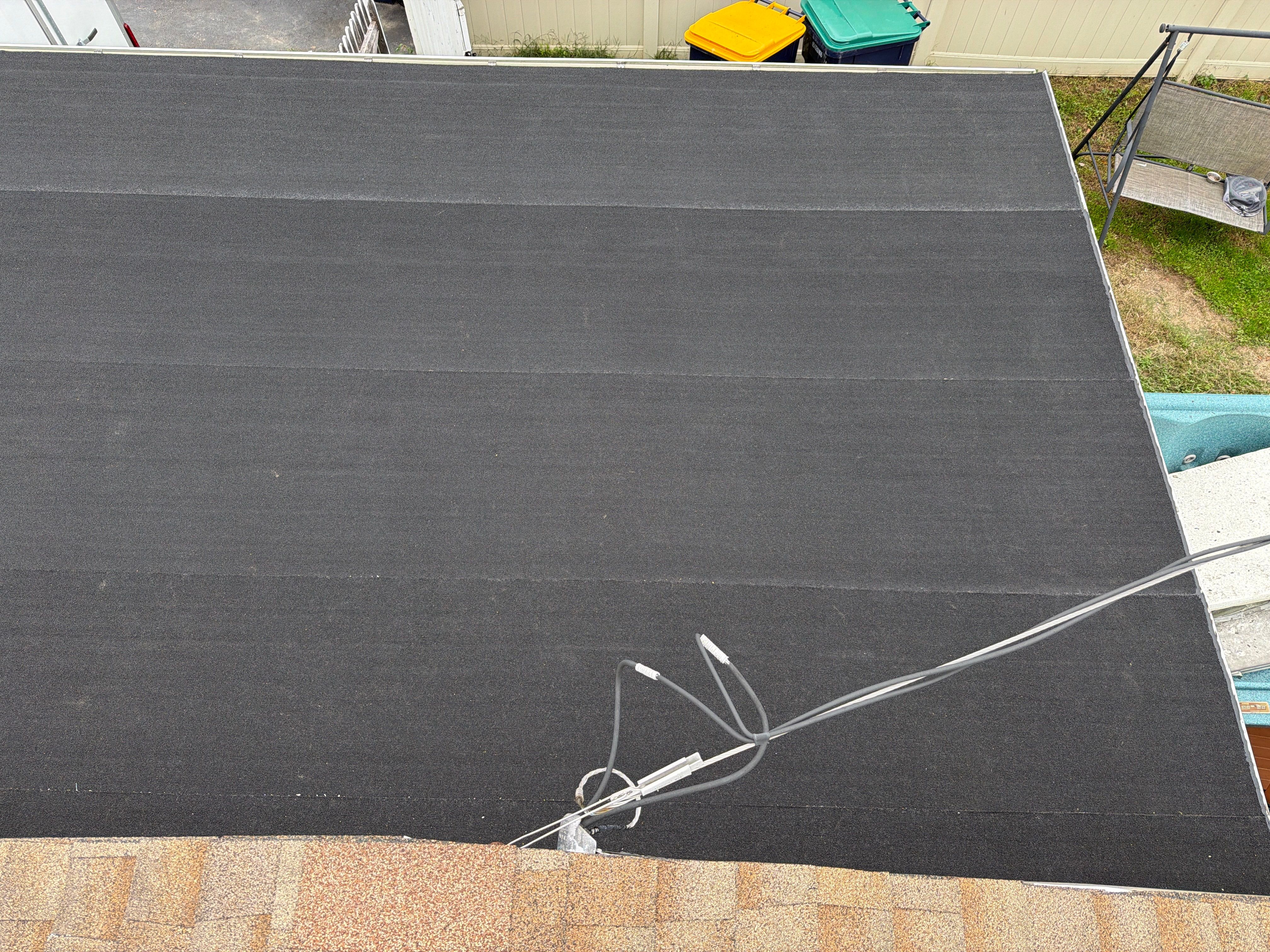Flat Roof Replacement and Shingle Integration in Levittown by Stofan Construction LLC