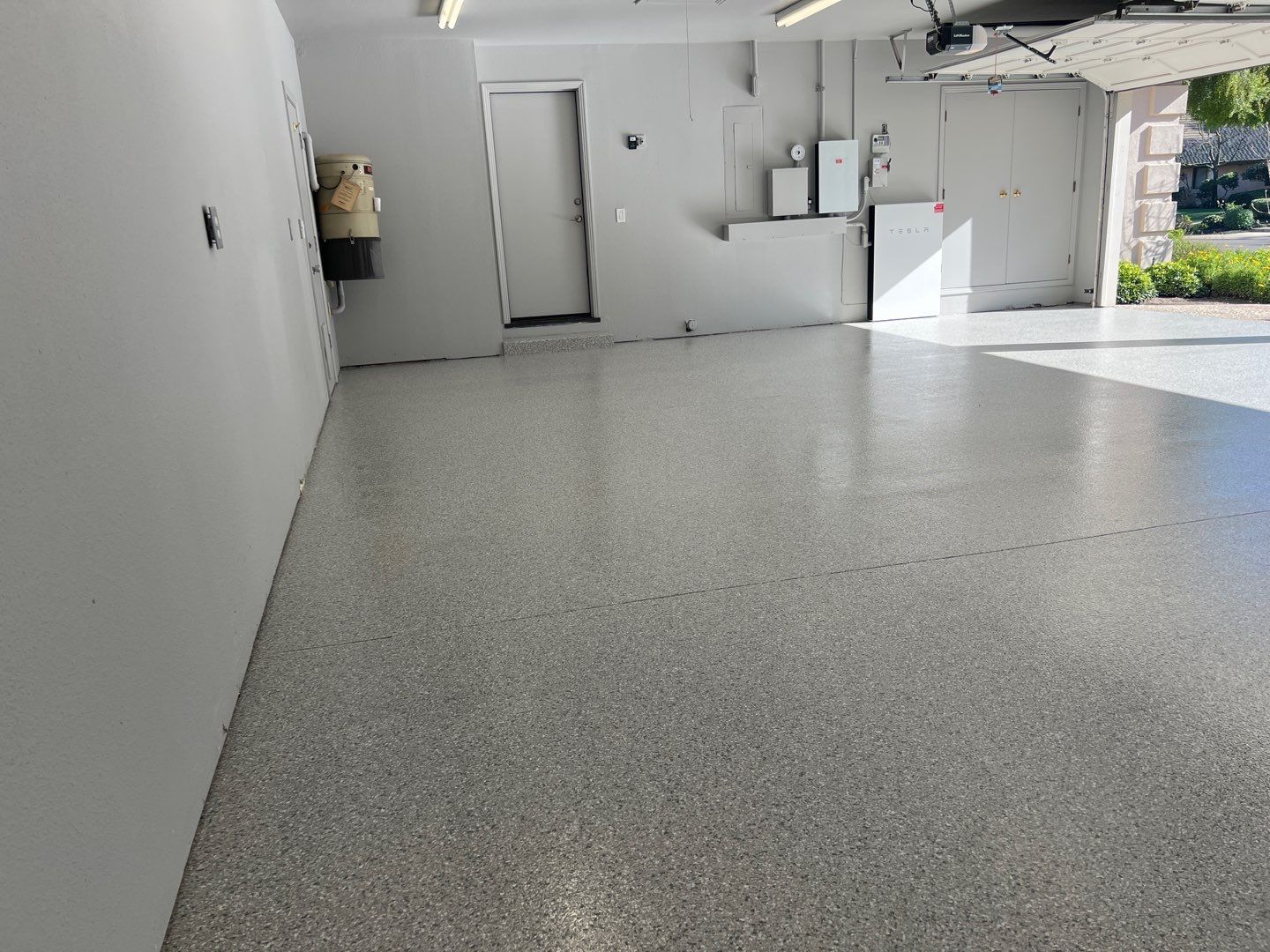 Garage Storage & Concrete Coating in Modesto by Lancaster Painting