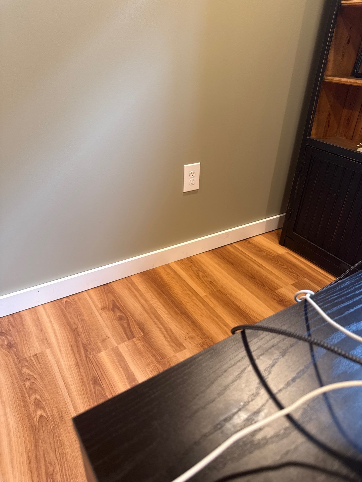 Lincoln Interior Renovation Featuring Sage Green Walls and Laminate Flooring by CompanyCam Sales Demo