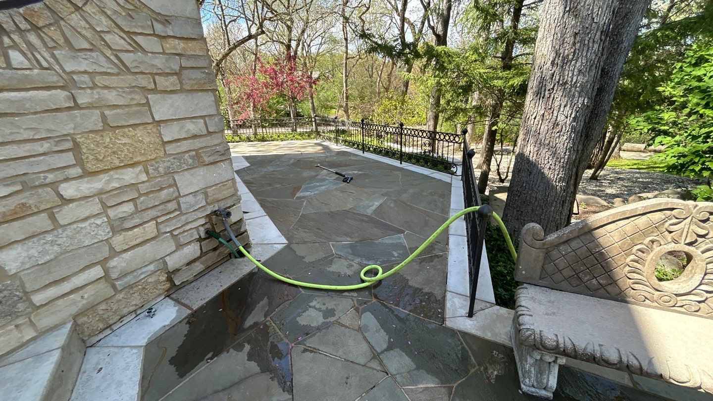natural stone using Algaecide, soft wash soap by Northern Power Washing LLC.