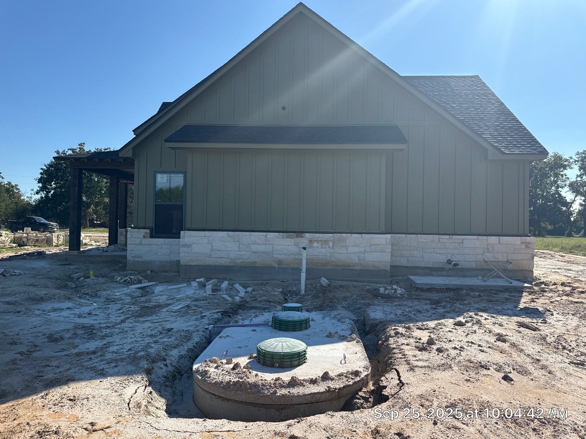 Cleveland Ranch Charm: Natural Stone Wainscot with Green Accent Siding. by Apex Conventional Stucco Llc