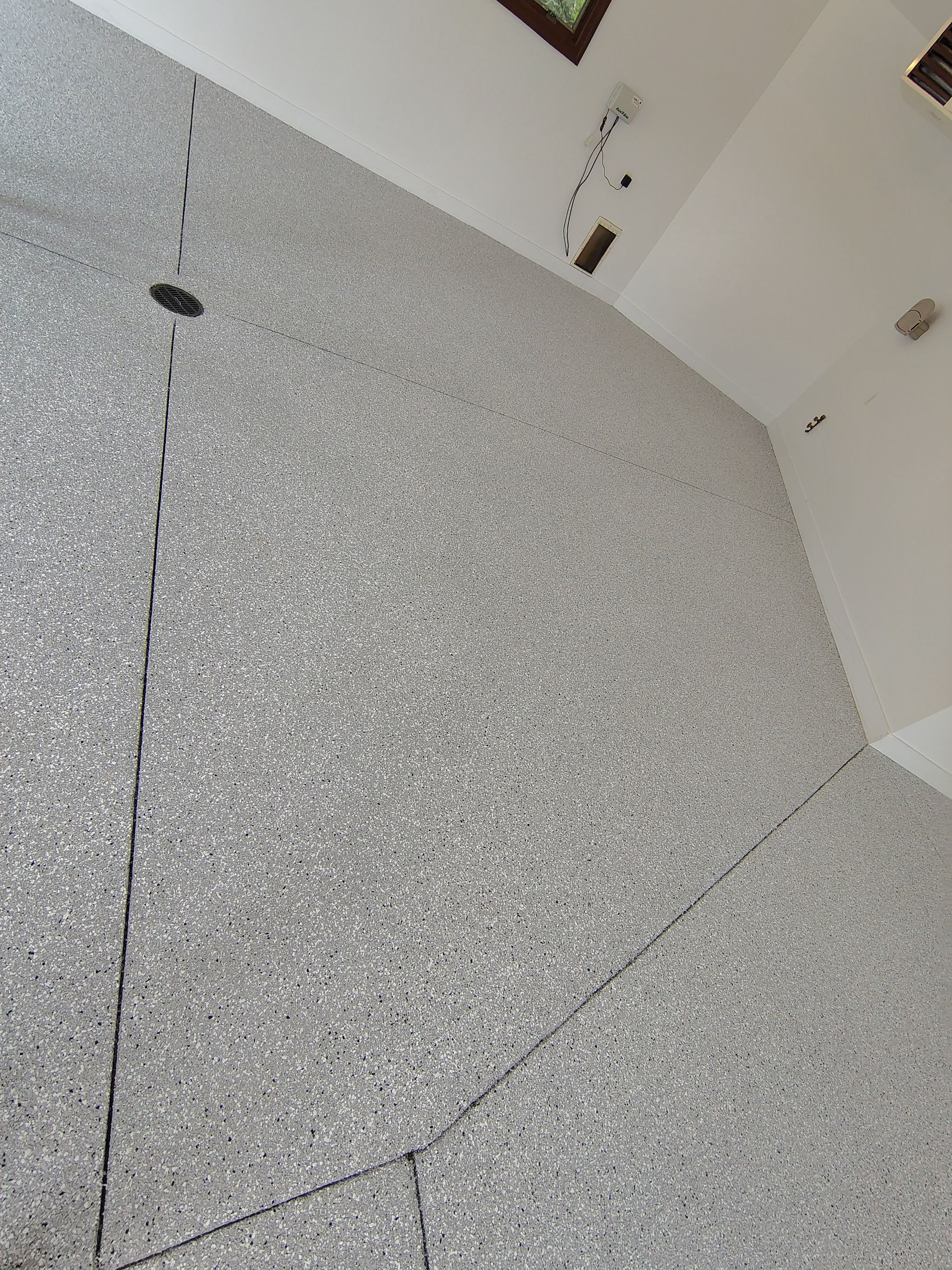 Feather Grey Floor Coating in Sioux Falls, SD by Select Painting, Coatings & Garage Cabinets