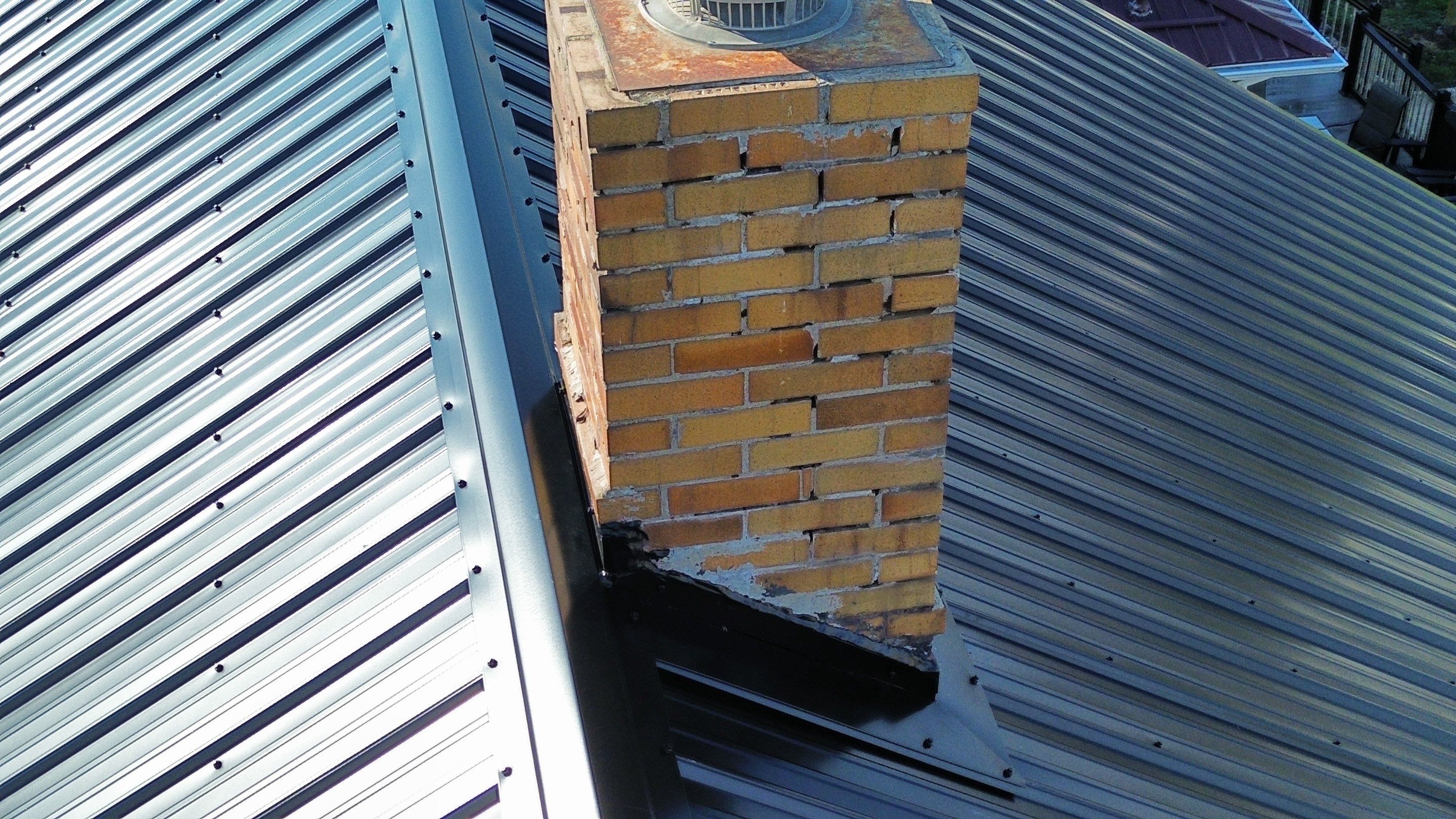 Residential Roofing Installation using Perfromance Panel Metal - Black by RoofX 