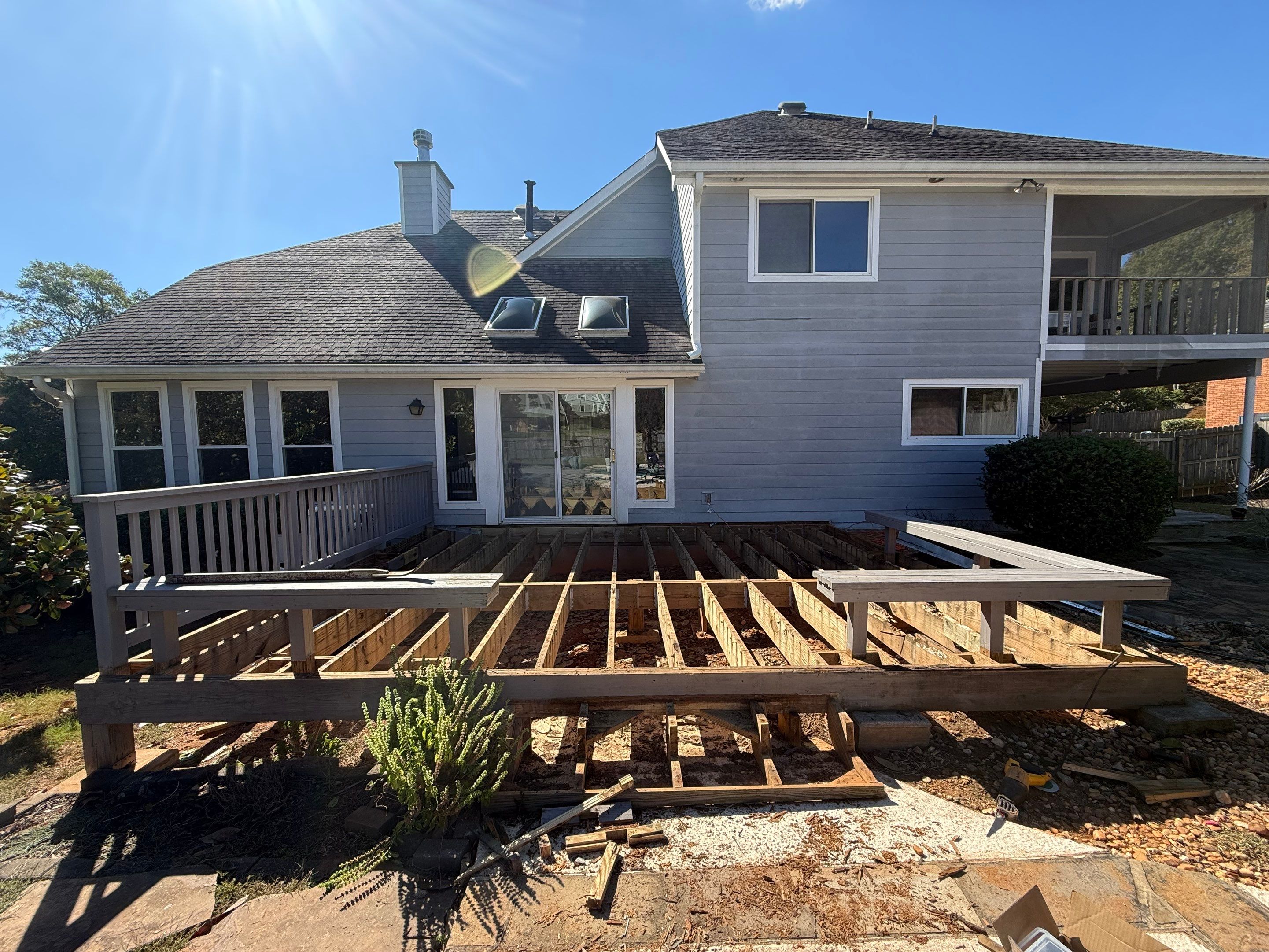 Custom Composite Deck with Integrated Seating in Roswell by Swift Home Renovations