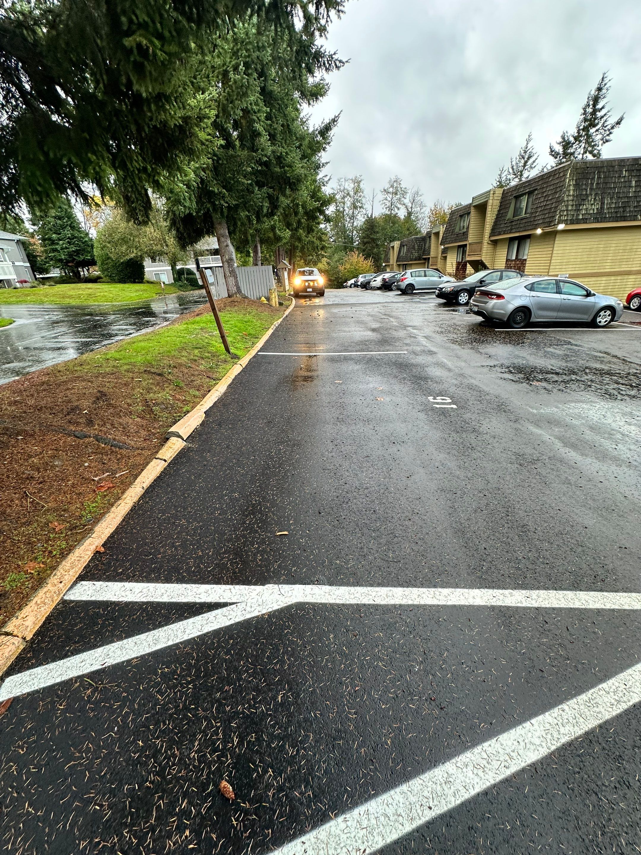 Dana | Sealcoat Parking Lot   by Jireh Asphalt & Concrete Inc 