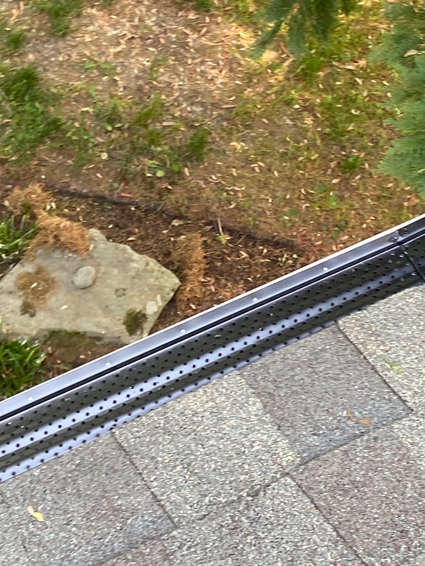 Gutter Installation using Black Gutter Guards  by Storm Ready Exteriors