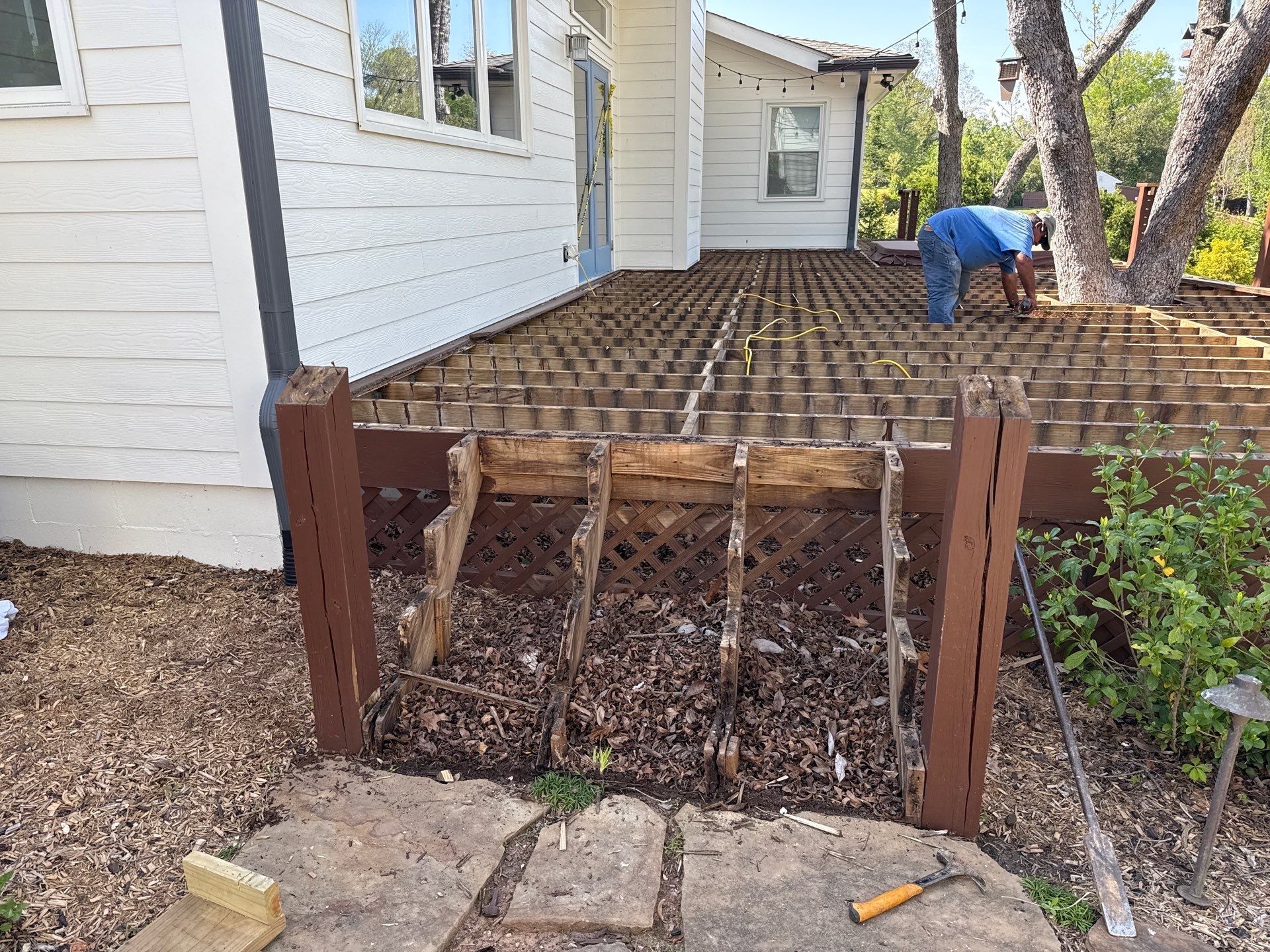 Deck Resurface with Glass Paneling and Deckorators Voyage Series Products by Nelson Exteriors 