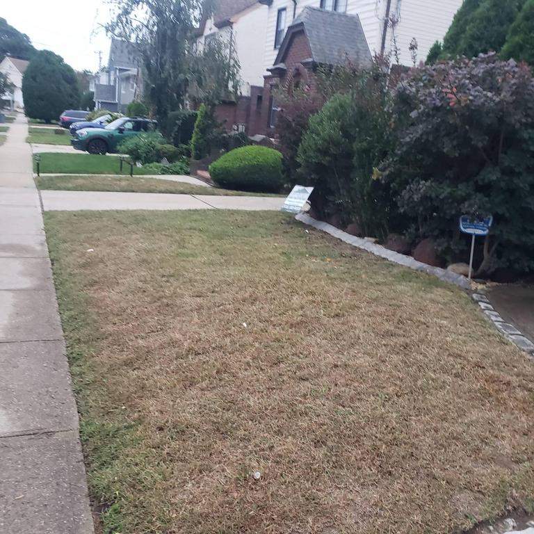 New Roof & Gutters by Island Roofing Inc.