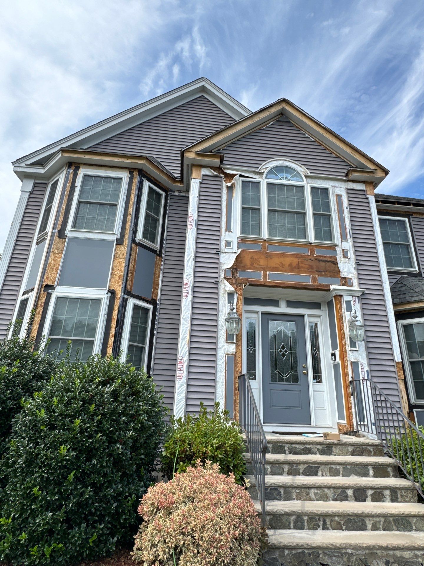 Roof, Trim, Deck, and Gutter Restoration by Mighty Dog Roofing of Greater Middlesex County