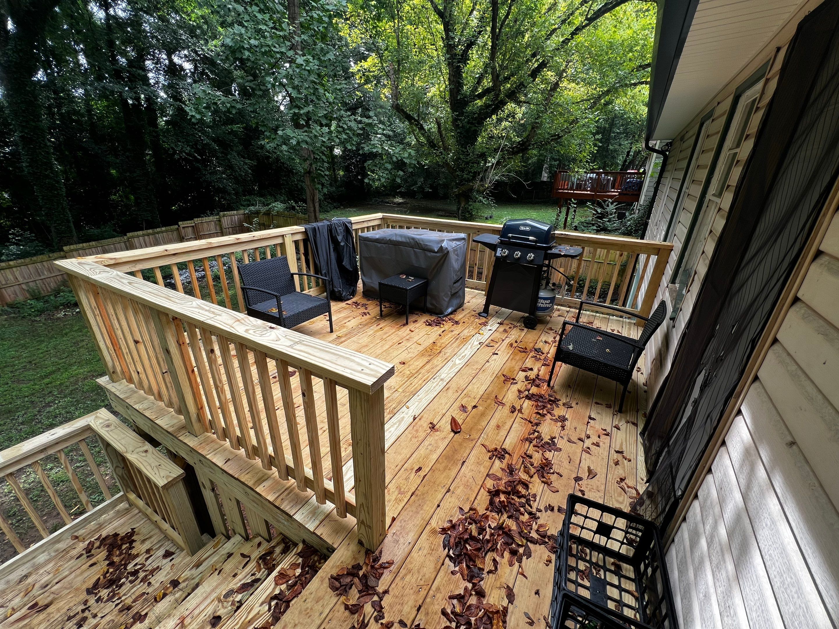 Elevated Pressure-Treated Wood Deck and Staircase Replacement in Atlanta by Swift Home Renovations