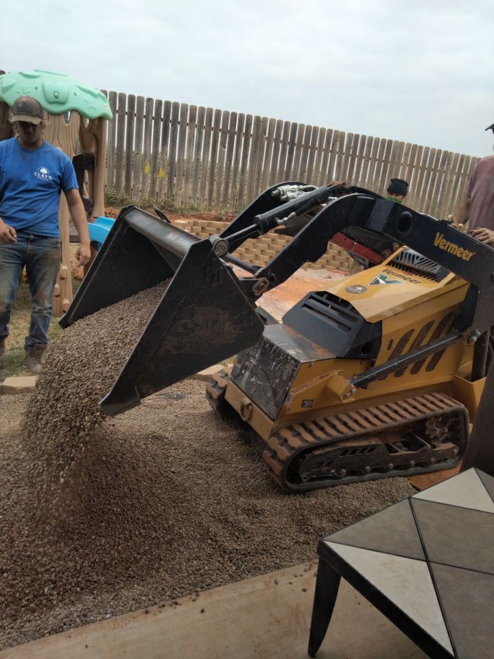 Retaining wall / Playground by Clays Services Inc