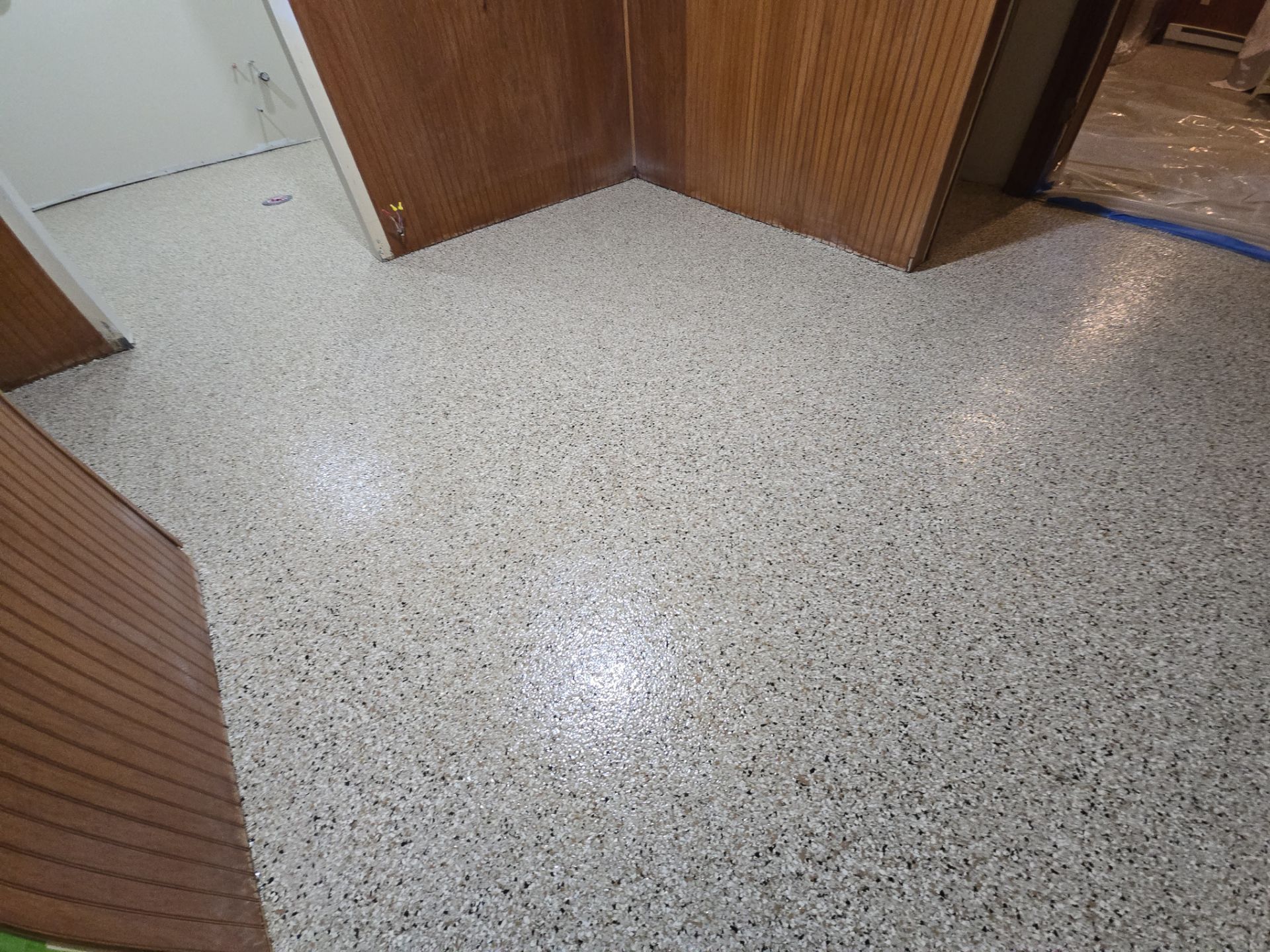 Basement Transformation using Driftwood by Croc Coatings, LLC