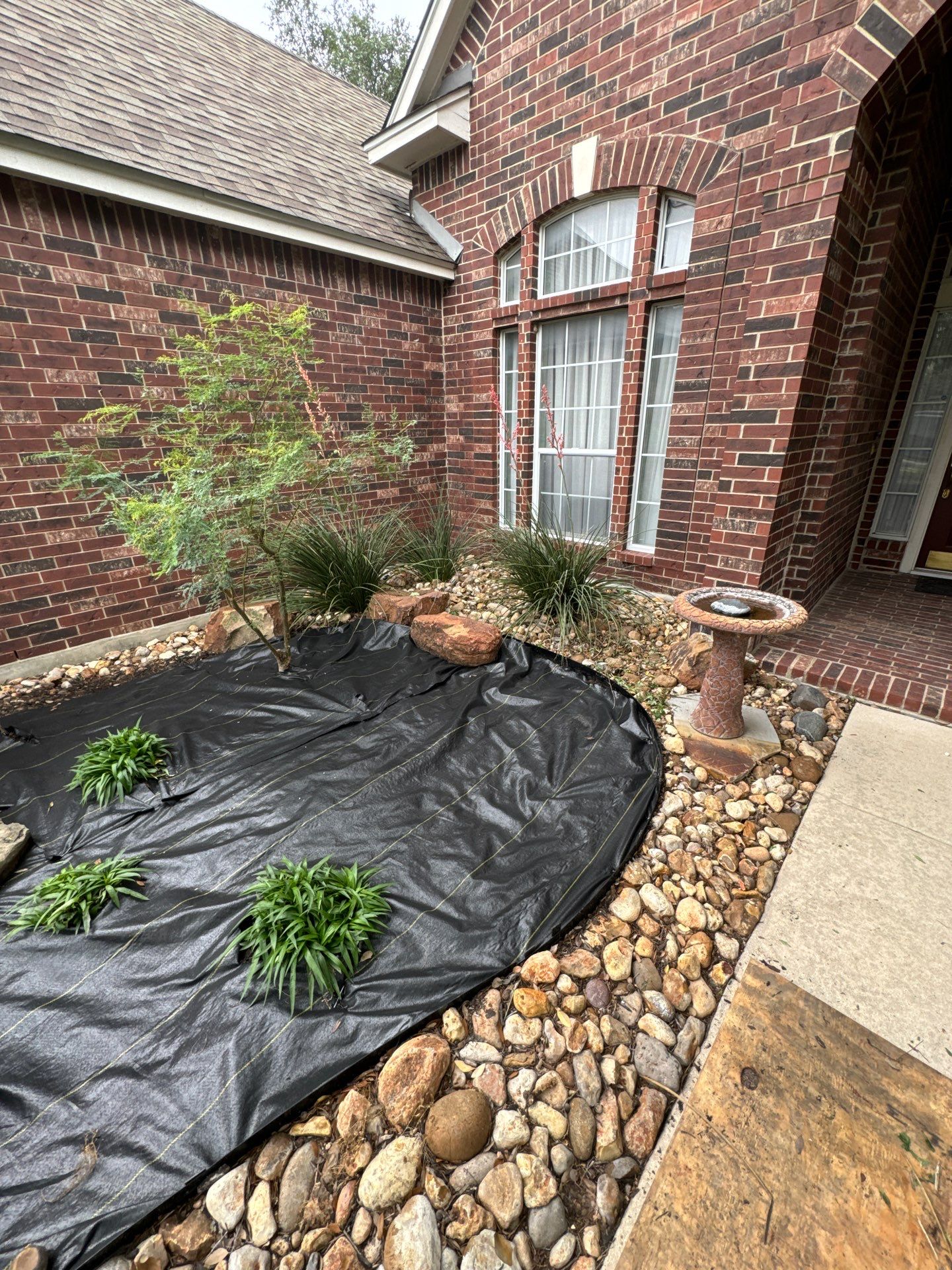 Landscaping Enhancement  using Texas Black Gravel by Hole In One Lawns, LLC