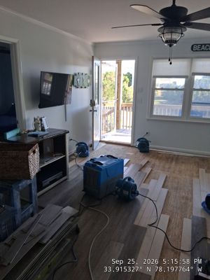 Oak Island Water Damage Restoration and Luxury Vinyl Plank Flooring Installation