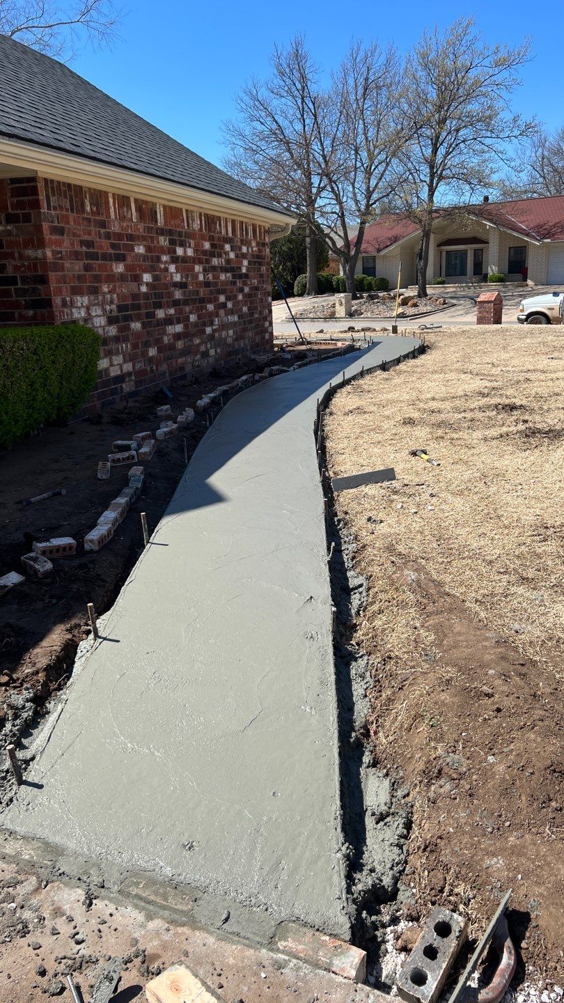 Concrete sidewalk using Concrete by Clays Services Inc