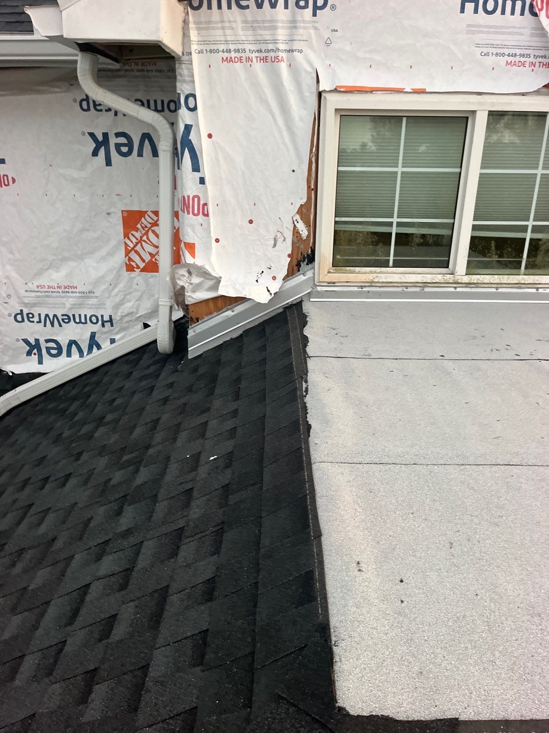 Shingle roof repair by Durabilis Roofing INC