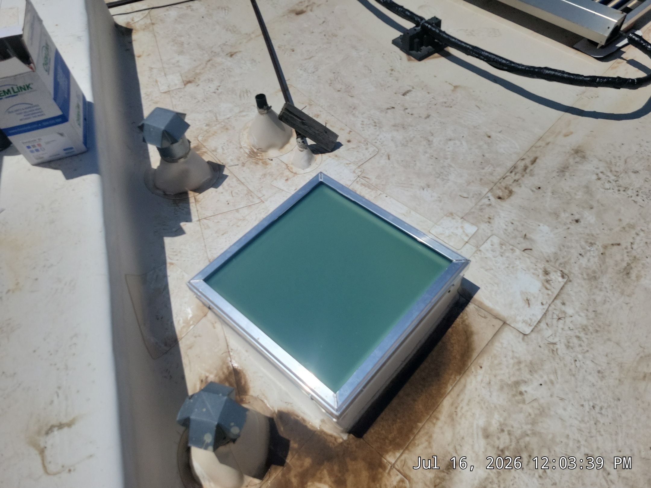 Low-e Glass Skylight Installation in Rio Rancho by Doyle Roof Masters Inc